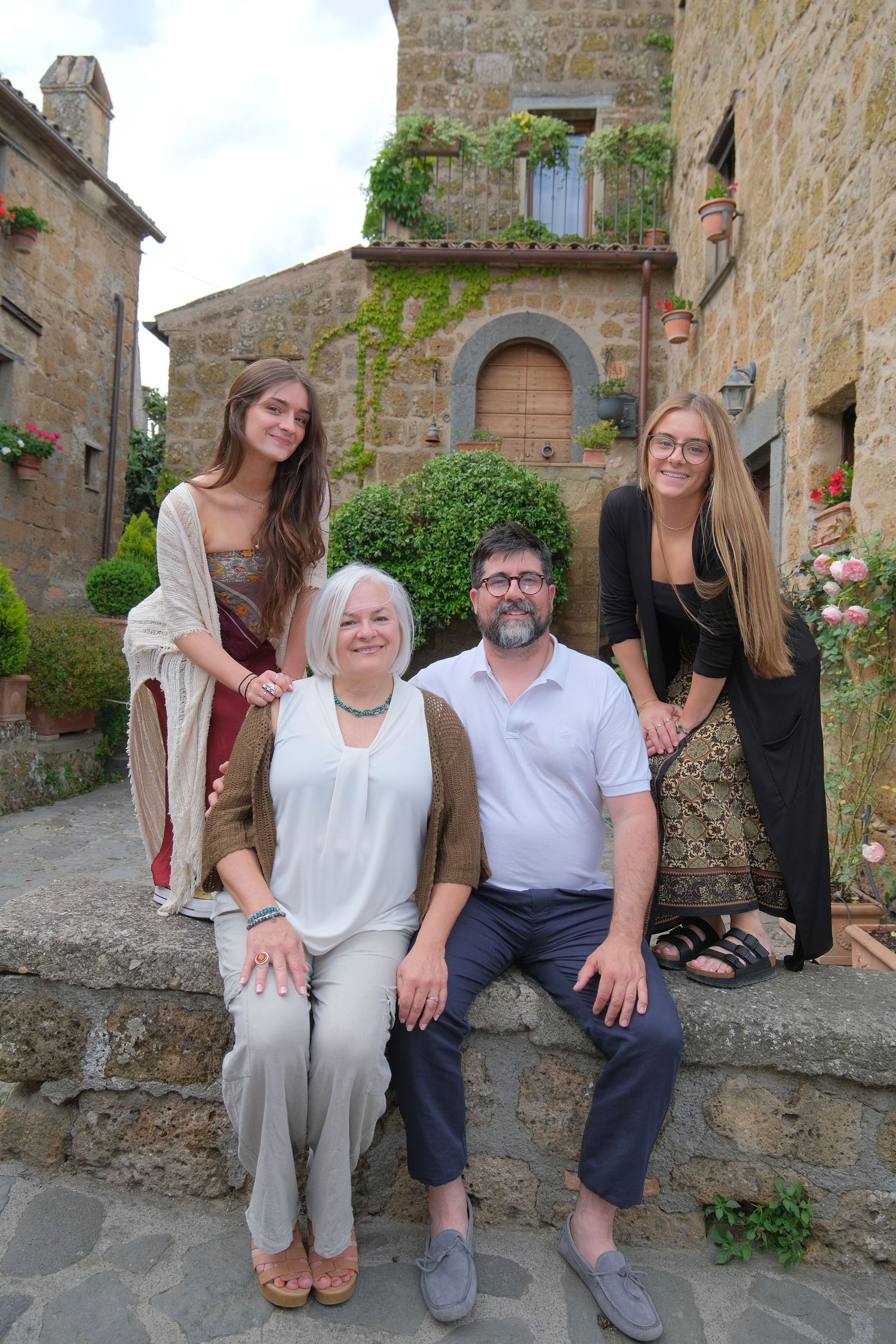 “Joyful family lifestyle photo in Italy capturing playful, natural moments with children and parents in Umbria and Tuscany.”