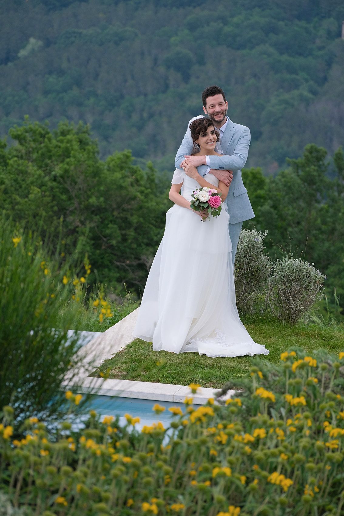 “Fun and joyful wedding photo in Italy capturing natural, playful, and loving moments of the bride and groom.”