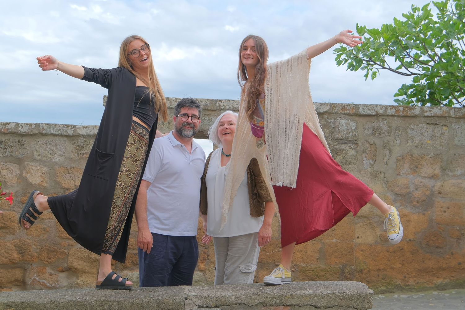 “Joyful family lifestyle photo in Italy capturing playful, natural moments with children and parents in Umbria and Tuscany.”