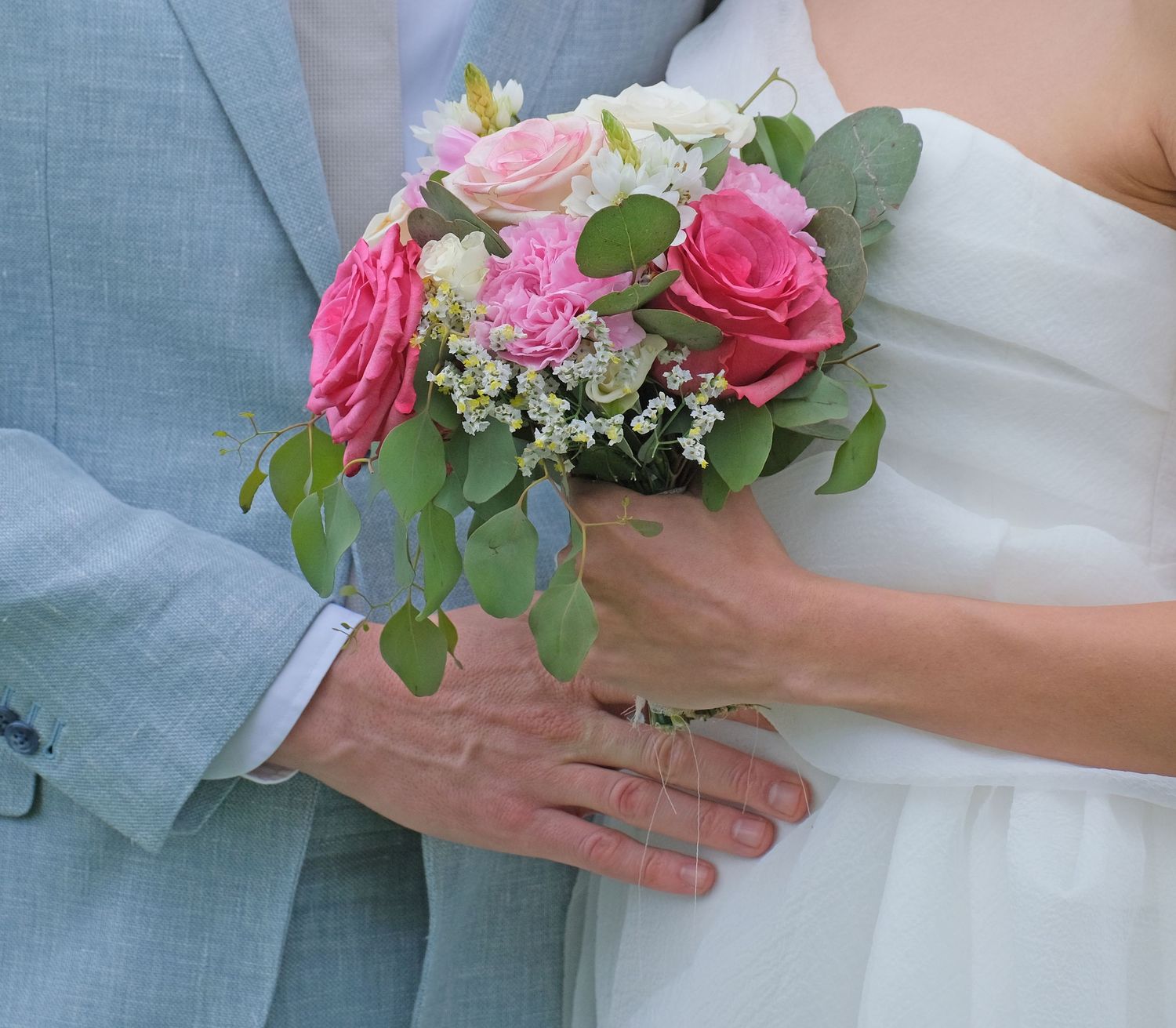 “Fun and joyful wedding photo in Italy capturing natural, playful, and loving moments of the bride and groom.”