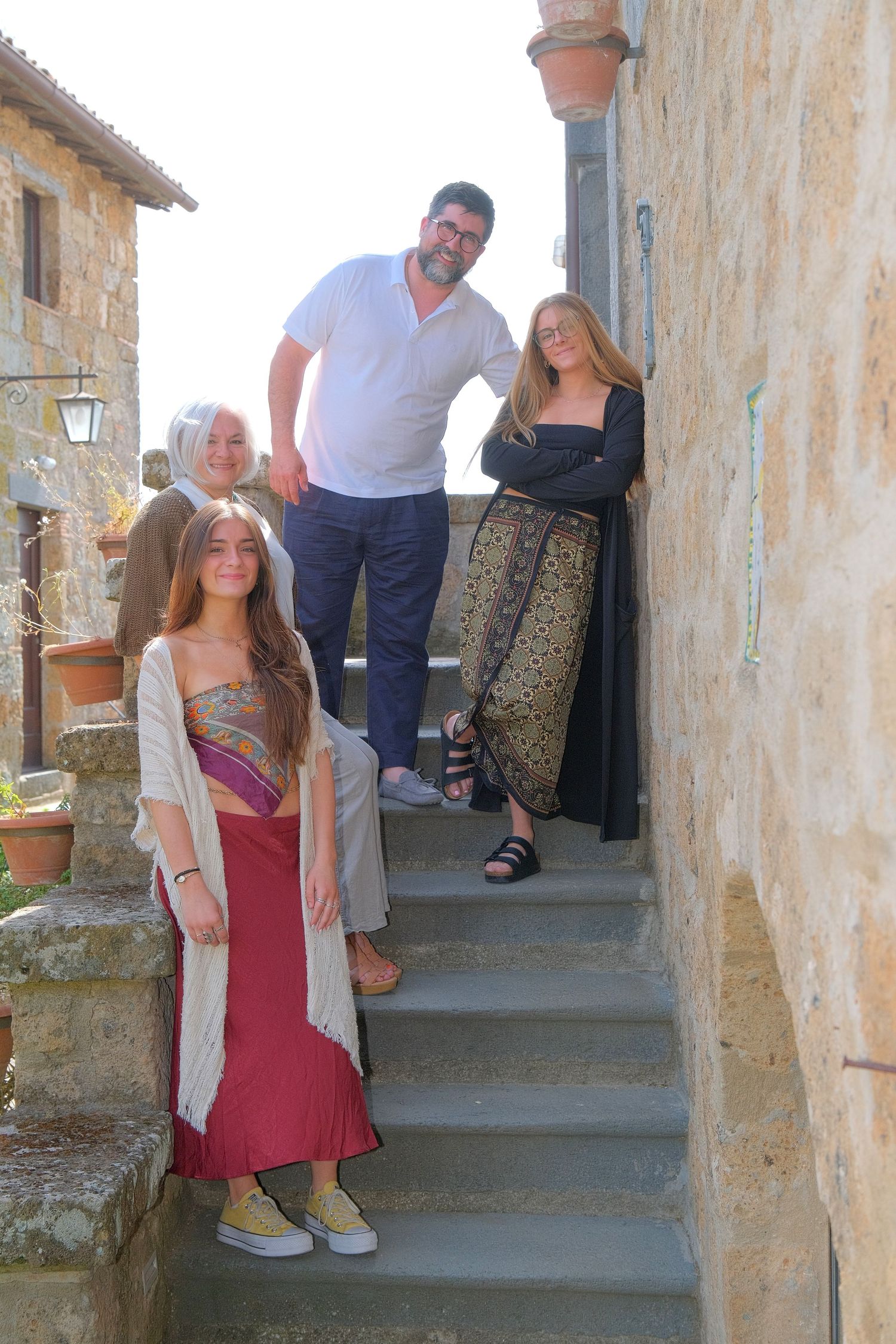“Joyful family lifestyle photo in Italy capturing playful, natural moments with children and parents in Umbria and Tuscany.”