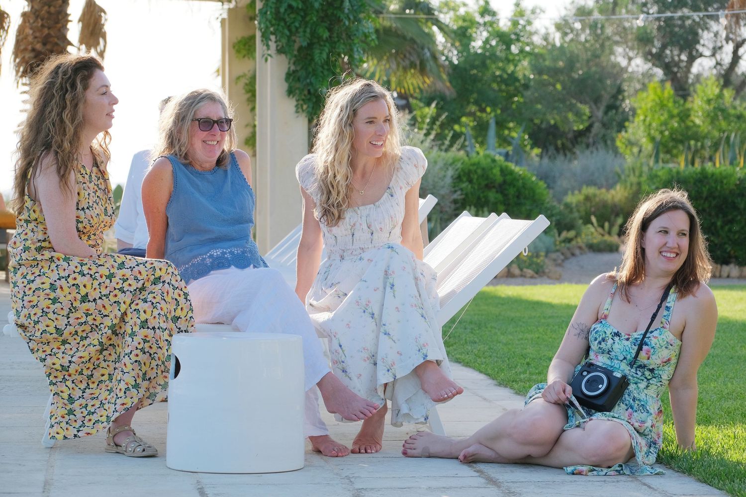 “Relaxed family portrait in Puglia enjoying fun, natural, and lively moments with children and parents.”