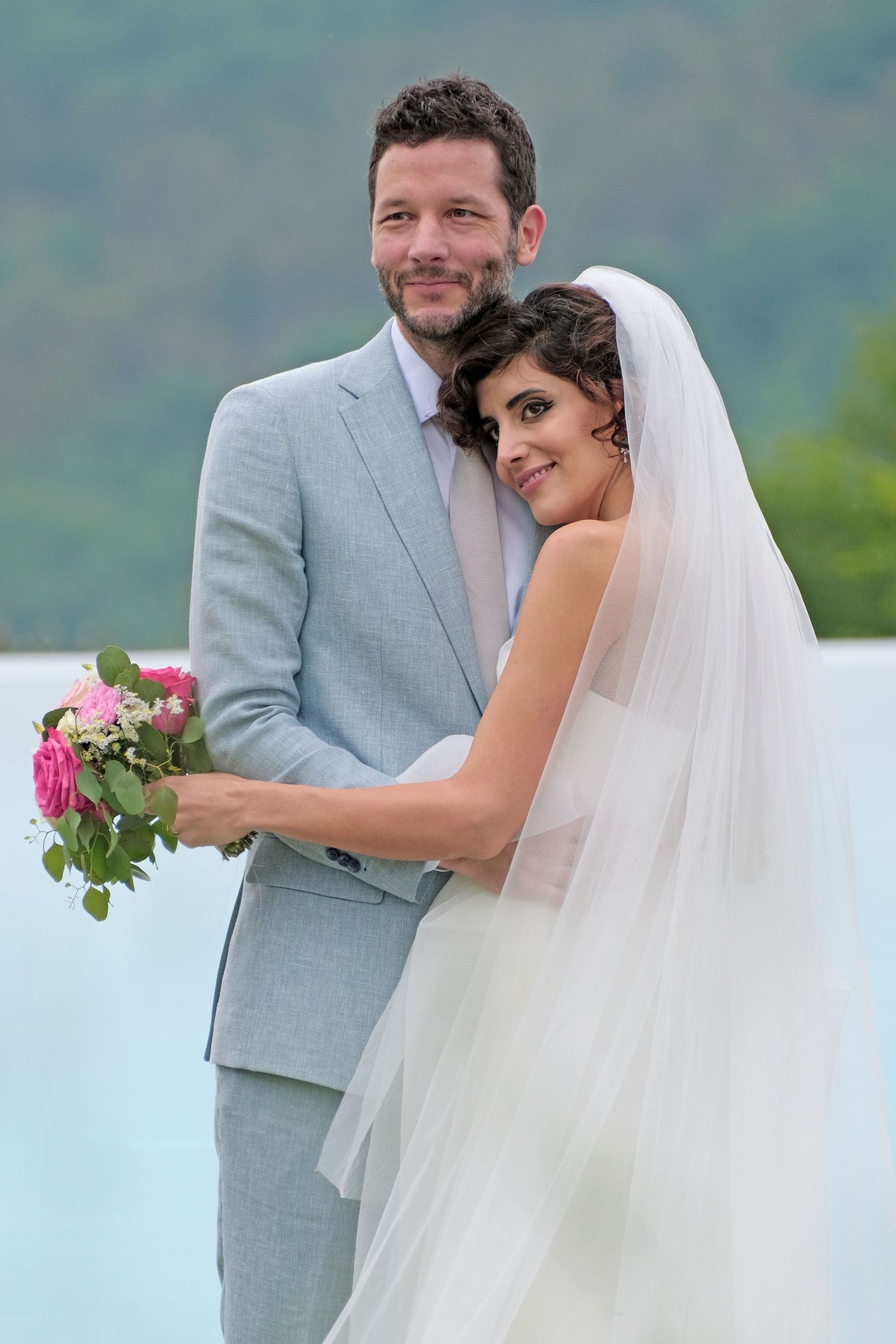 “Fun and joyful wedding photo in Italy capturing natural, playful, and loving moments of the bride and groom.”