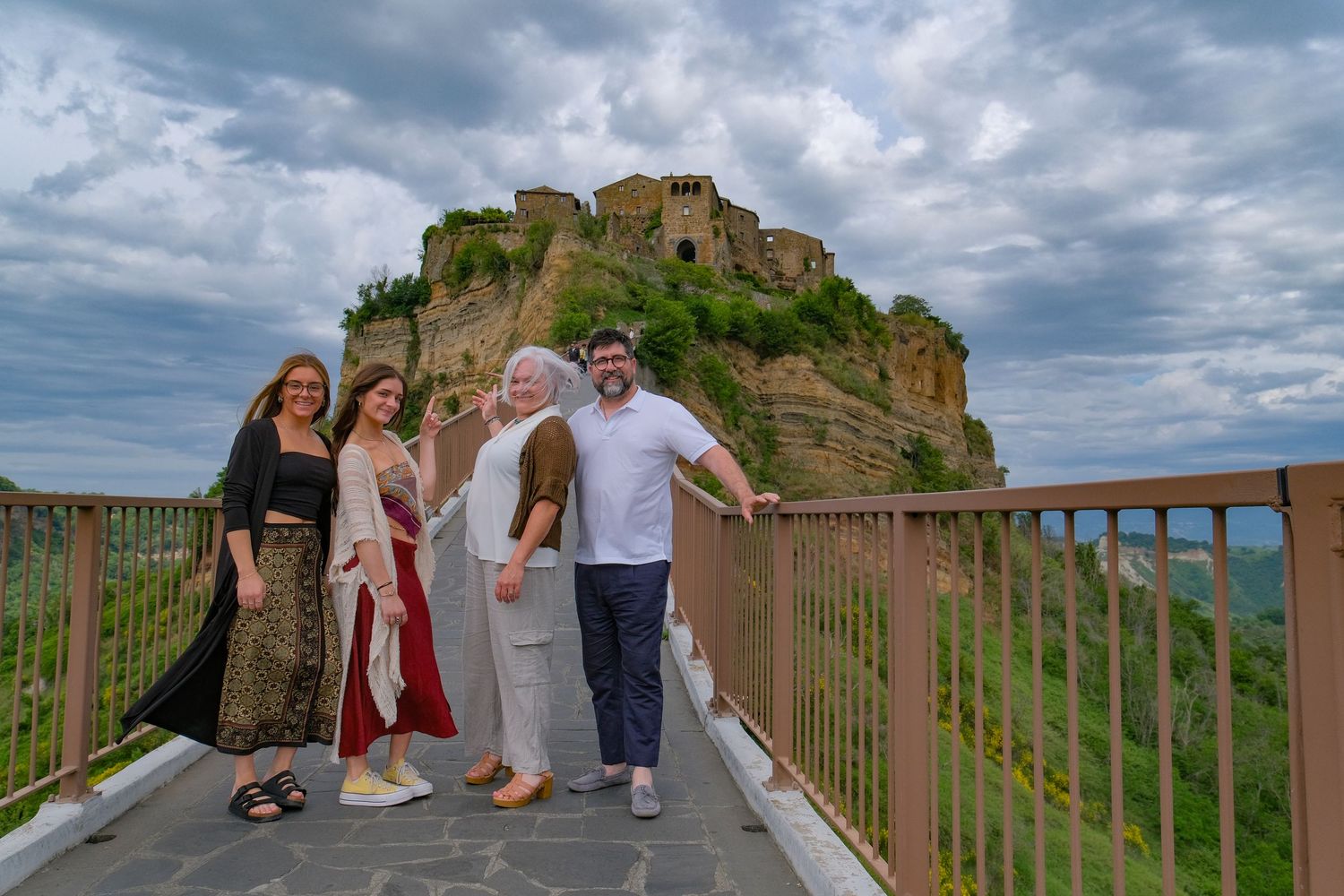 “Joyful family lifestyle photo in Italy capturing playful, natural moments with children and parents in Umbria and Tuscany.”