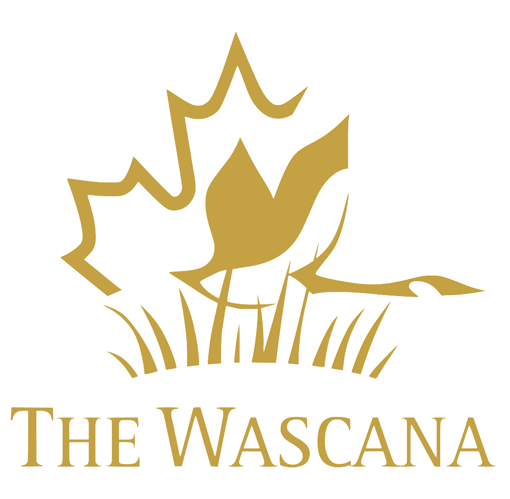 Gold logo of The Wascana featuring a maple leaf with a heron and reeds, elegant Canadian hospitality branding.