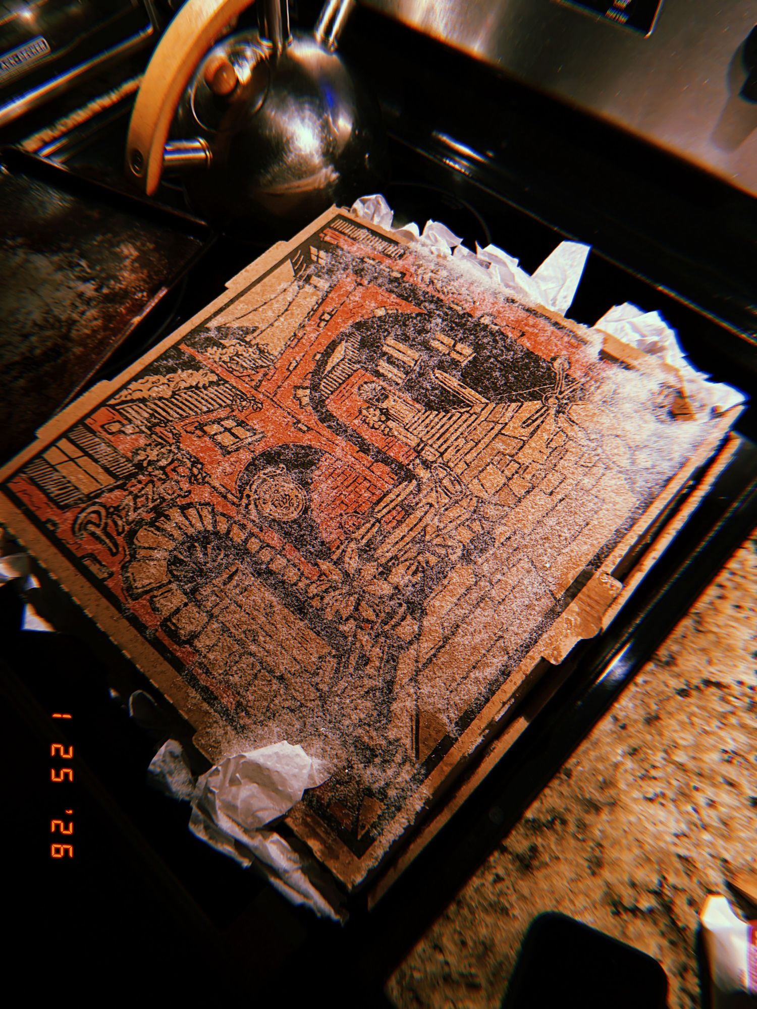 A series of photos showing the progression of carving a detailed linoleum block print design in warm lighting.