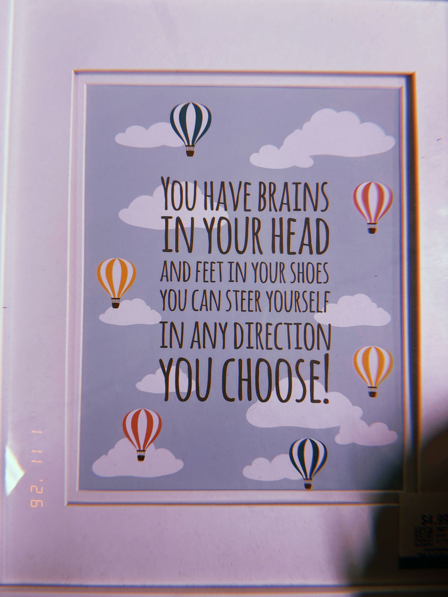 Three decorative wall art prints featuring hot air balloon designs and inspirational quotes in blue and white colors.