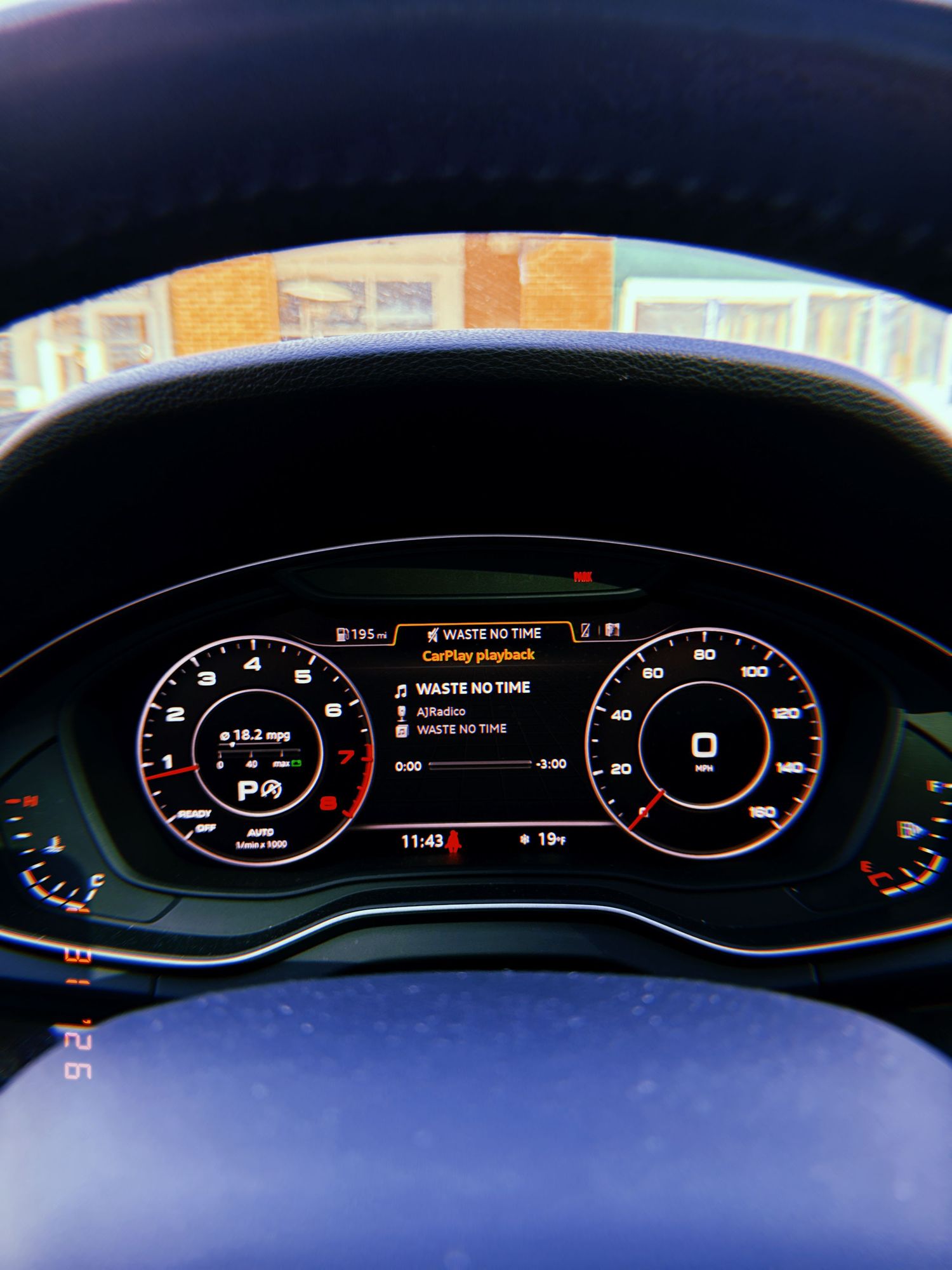 Digital instrument cluster display showing various vehicle gauges and indicators in a modern car dashboard.