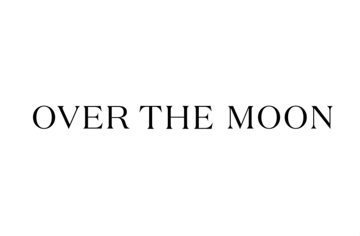 Simple black text reading OVER THE MOON in an elegant uppercase serif font on a white background.