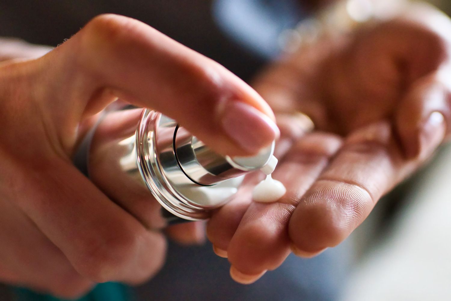 Close-up shots of hands manipulating small objects or devices.