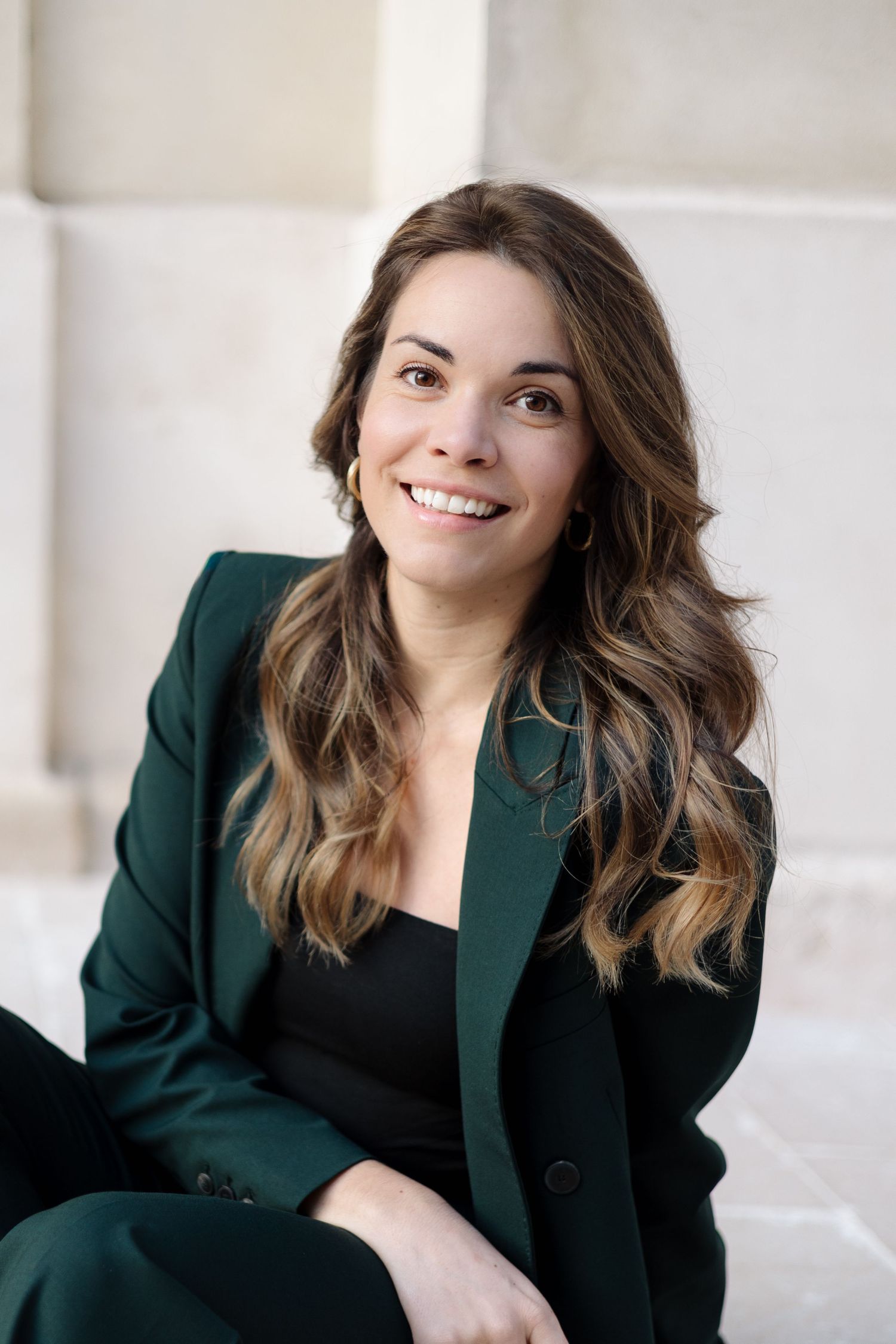 Professional portrait session showing joyful expressions against white background.