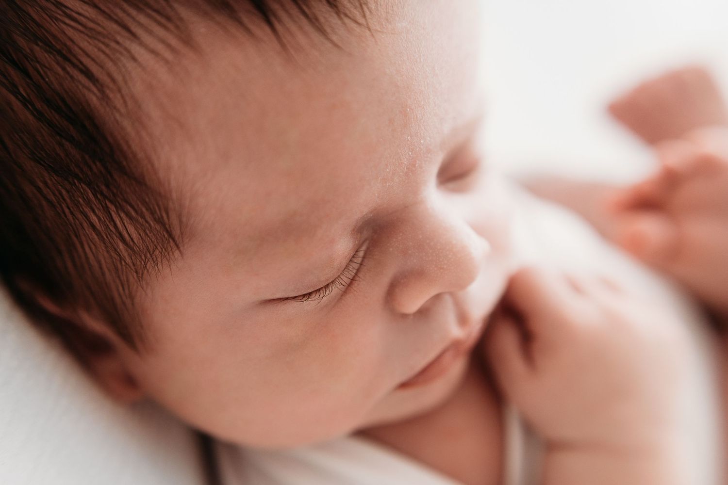 Cute photo of baby boys face. Newborn macro photo by Santa Fe photographer. Los Alamos & Rio Rancho photographer for bab