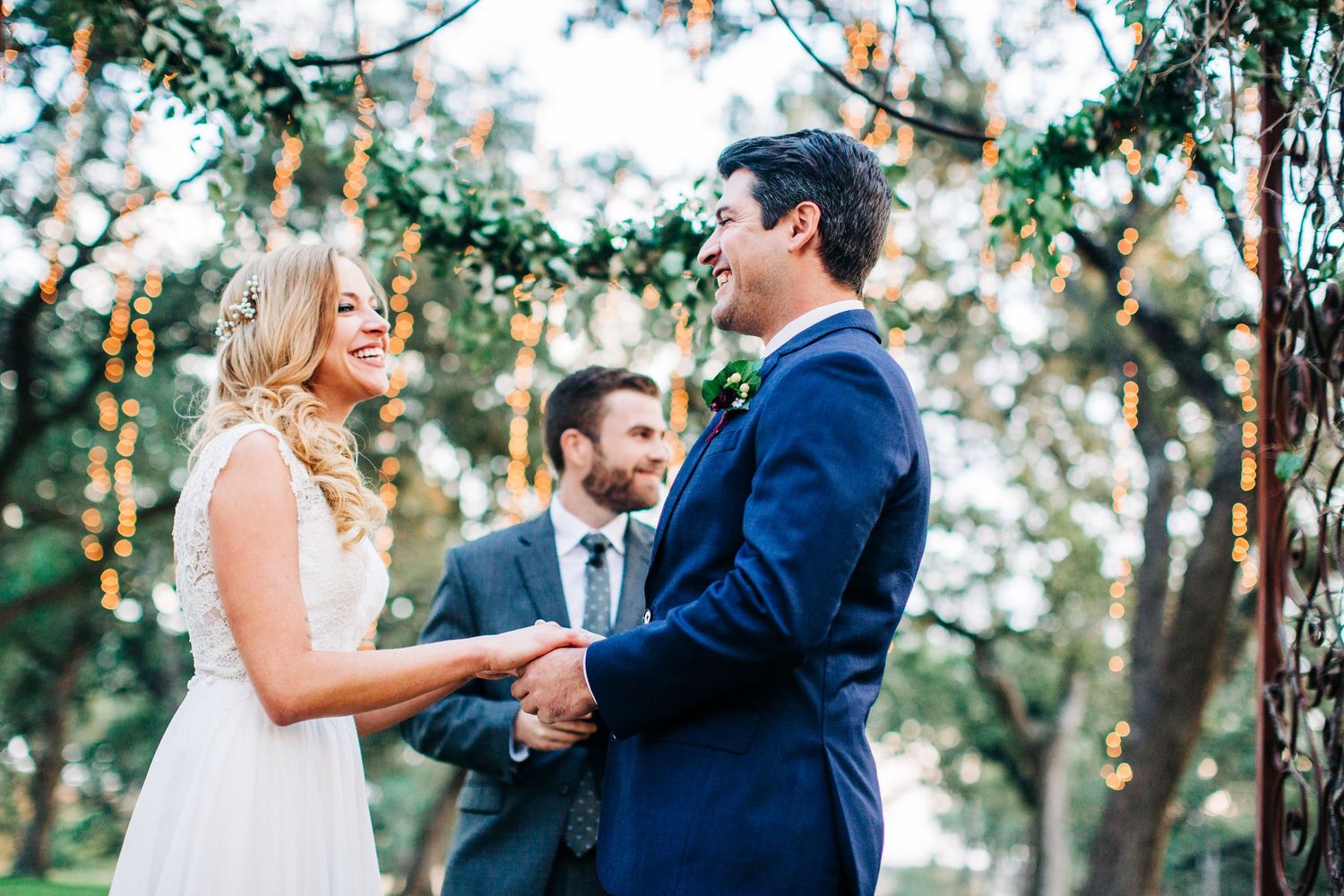 Bride and groom sharing a candid moment on their wedding day
