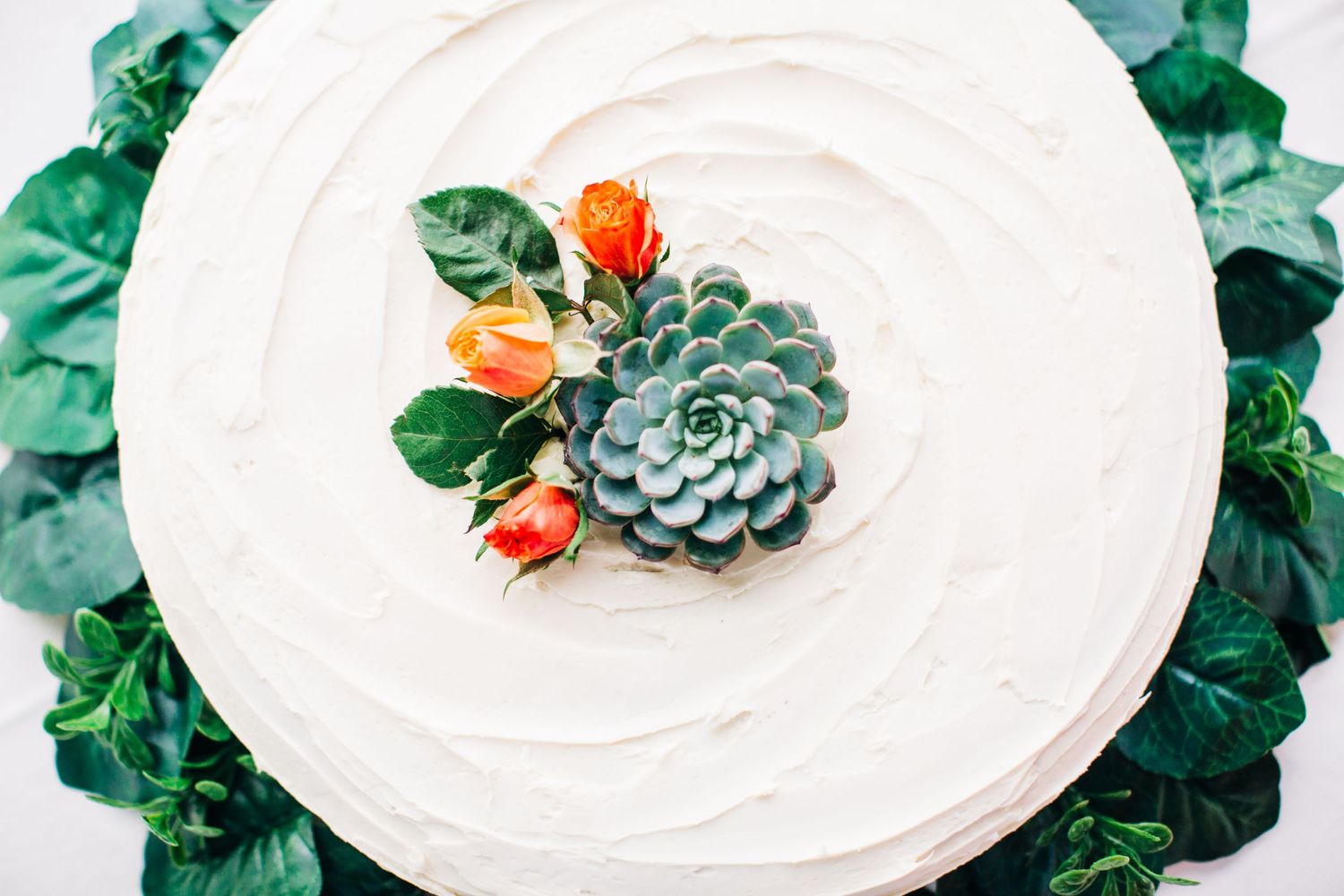Wedding reception detail with table setting and florals