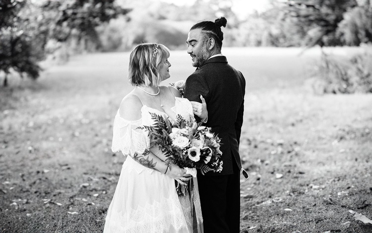 Bride and groom sharing a candid moment on their wedding day