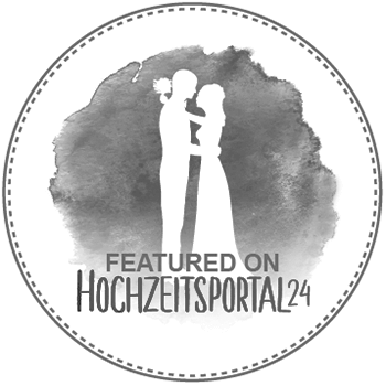 Black and white logo featuring silhouette of couple for German wedding portal website..