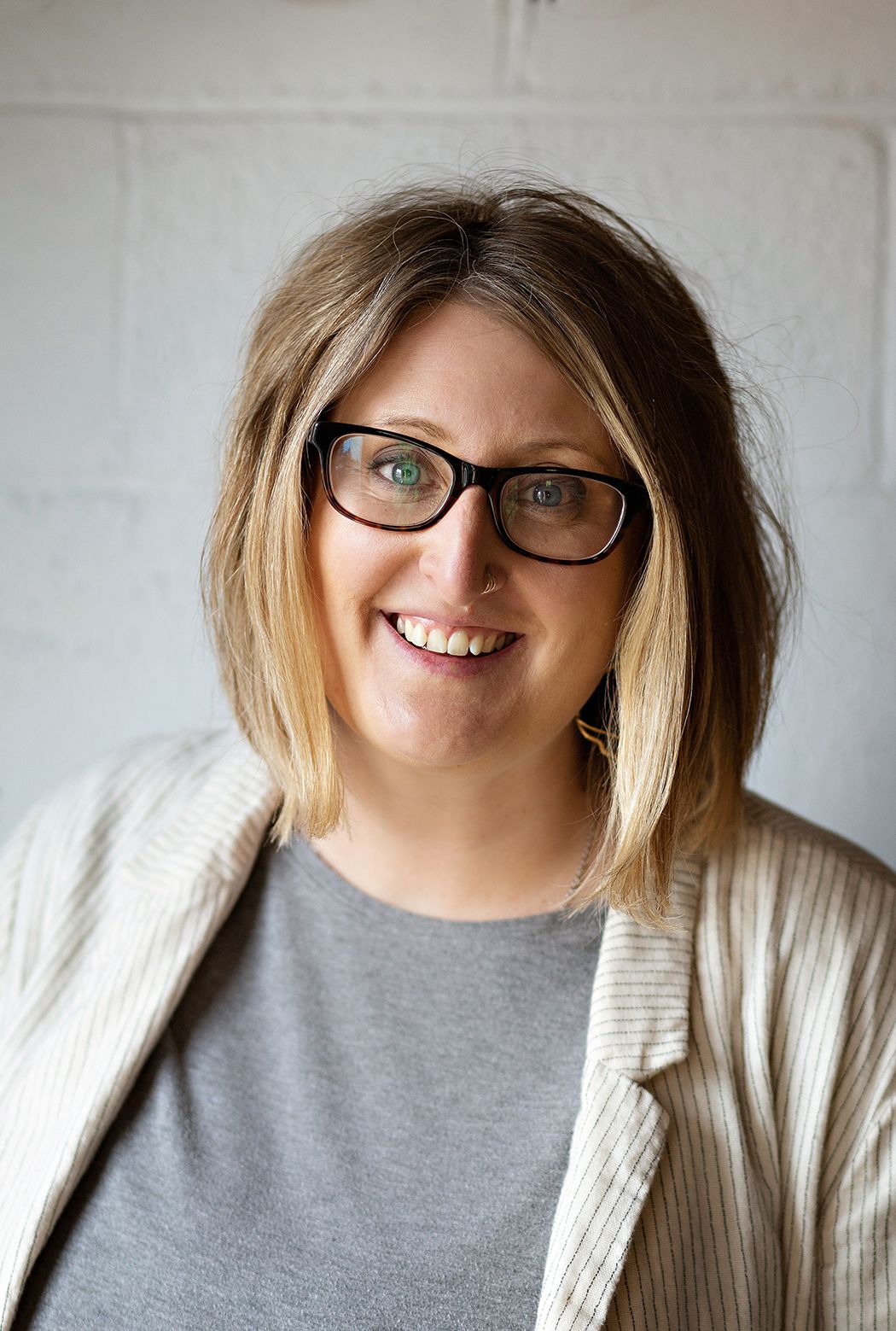 Professional headshot of a food photographer.