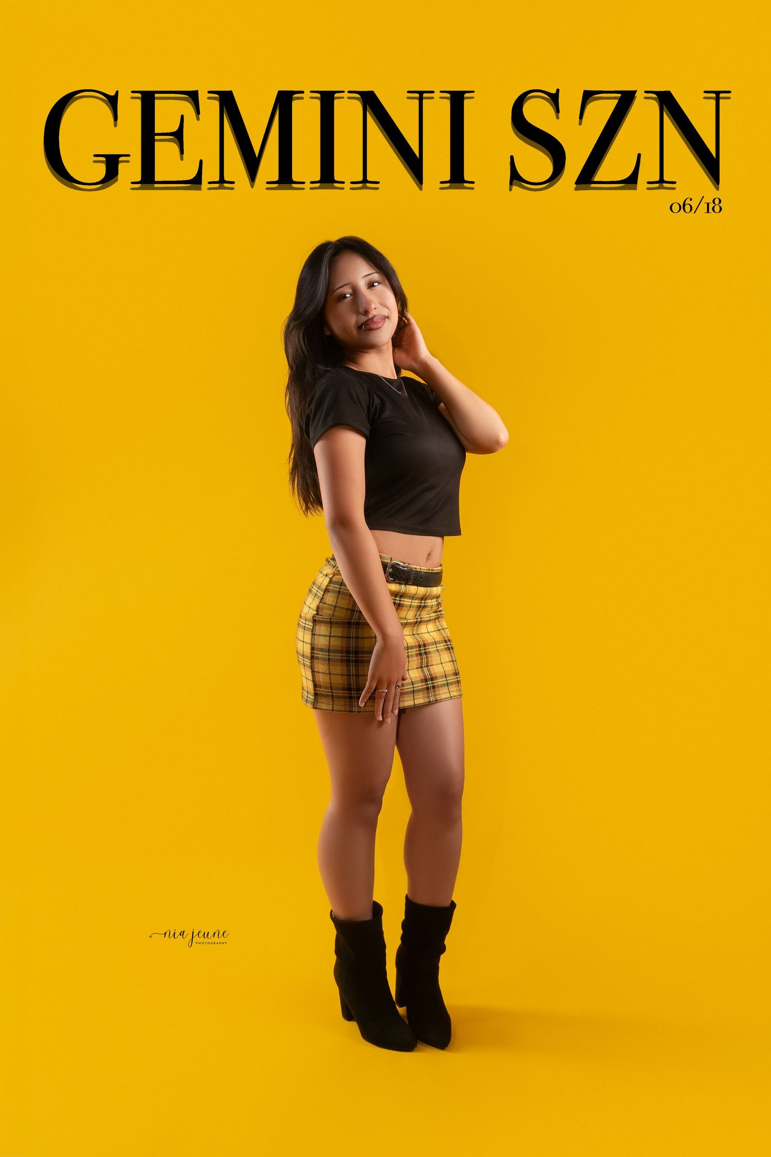 Fashion model poses in crop top and plaid shorts against vibrant yellow background with text overlay.