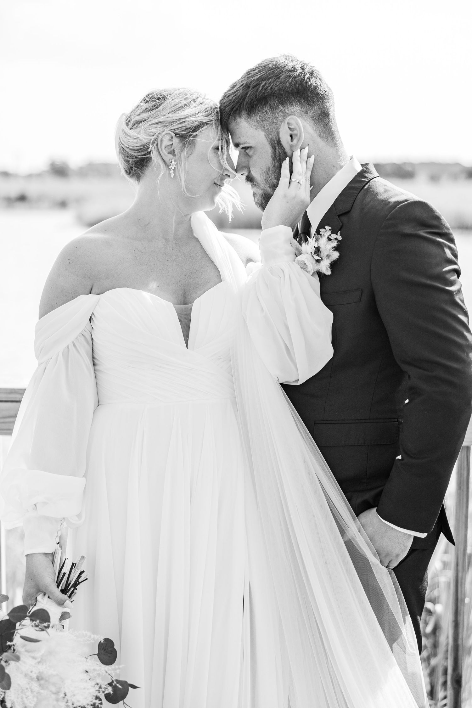 Intimate black and white wedding moments captured in a series of romantic close-ups.