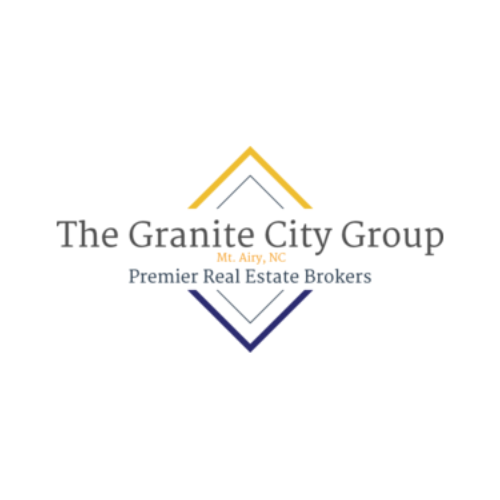 Minimalist real estate logo with gold and navy diamond shape and professional typography.