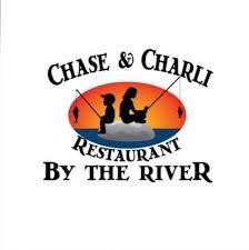 Restaurant logo design featuring two silhouetted figures fishing against an orange sunset with text 'Chase & Charli by the River'.