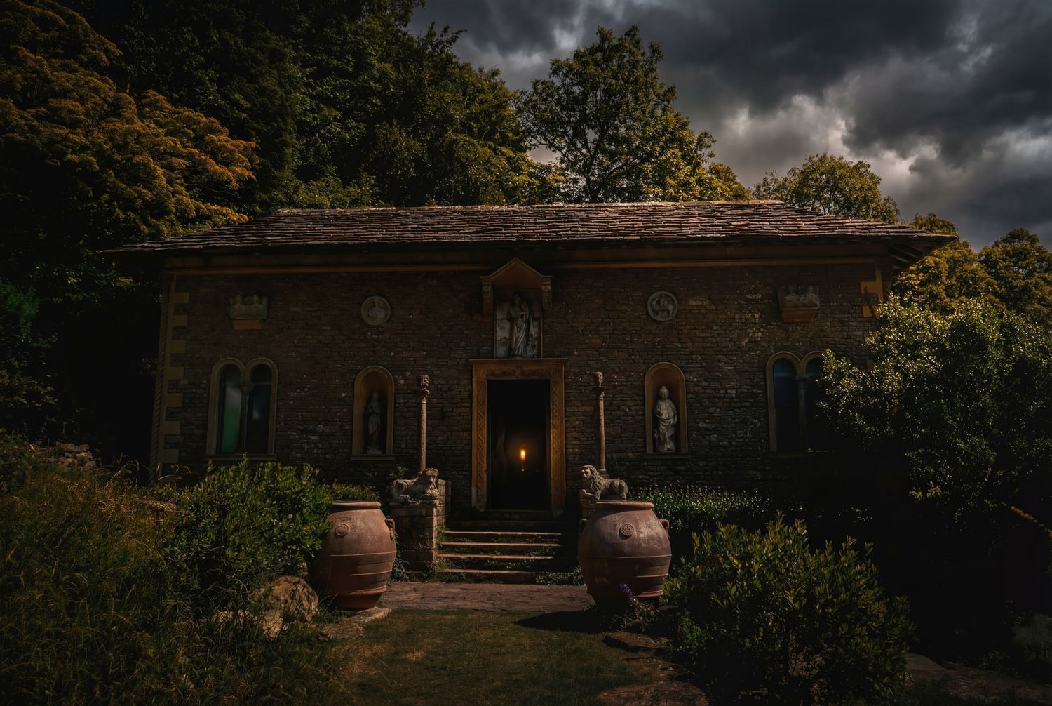 A series of moody architectural photographs showing rustic stone buildings and garden features under dramatic stormy skies.