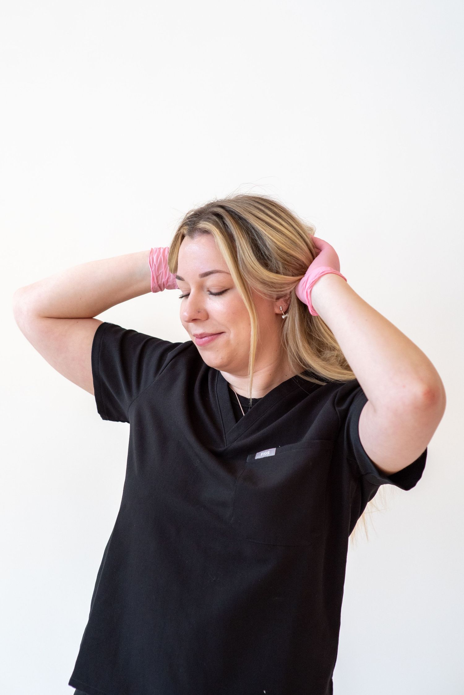 Esthetician branding photos in a natural light studio in Raleigh North Carolina