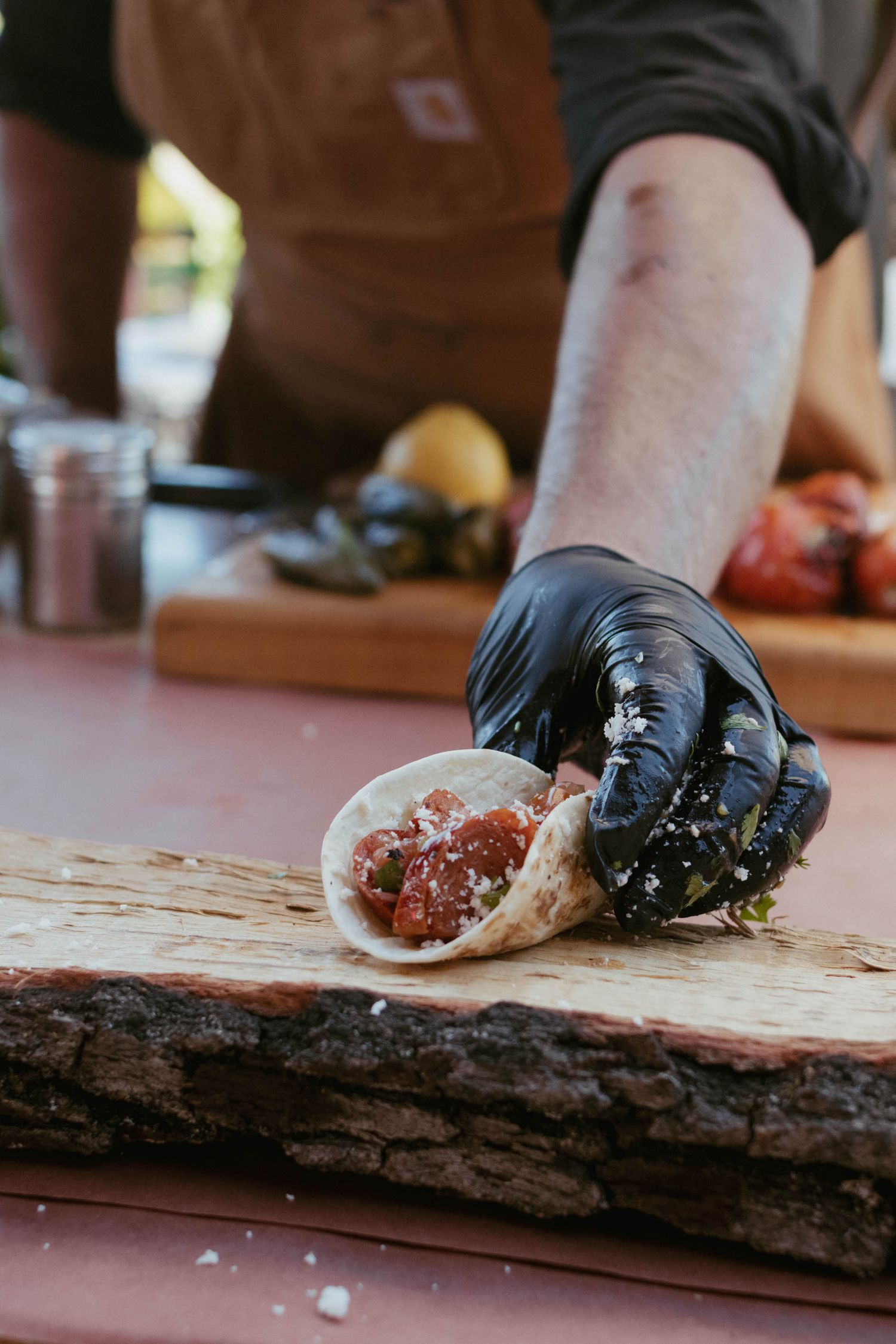 chef presents linguica taco