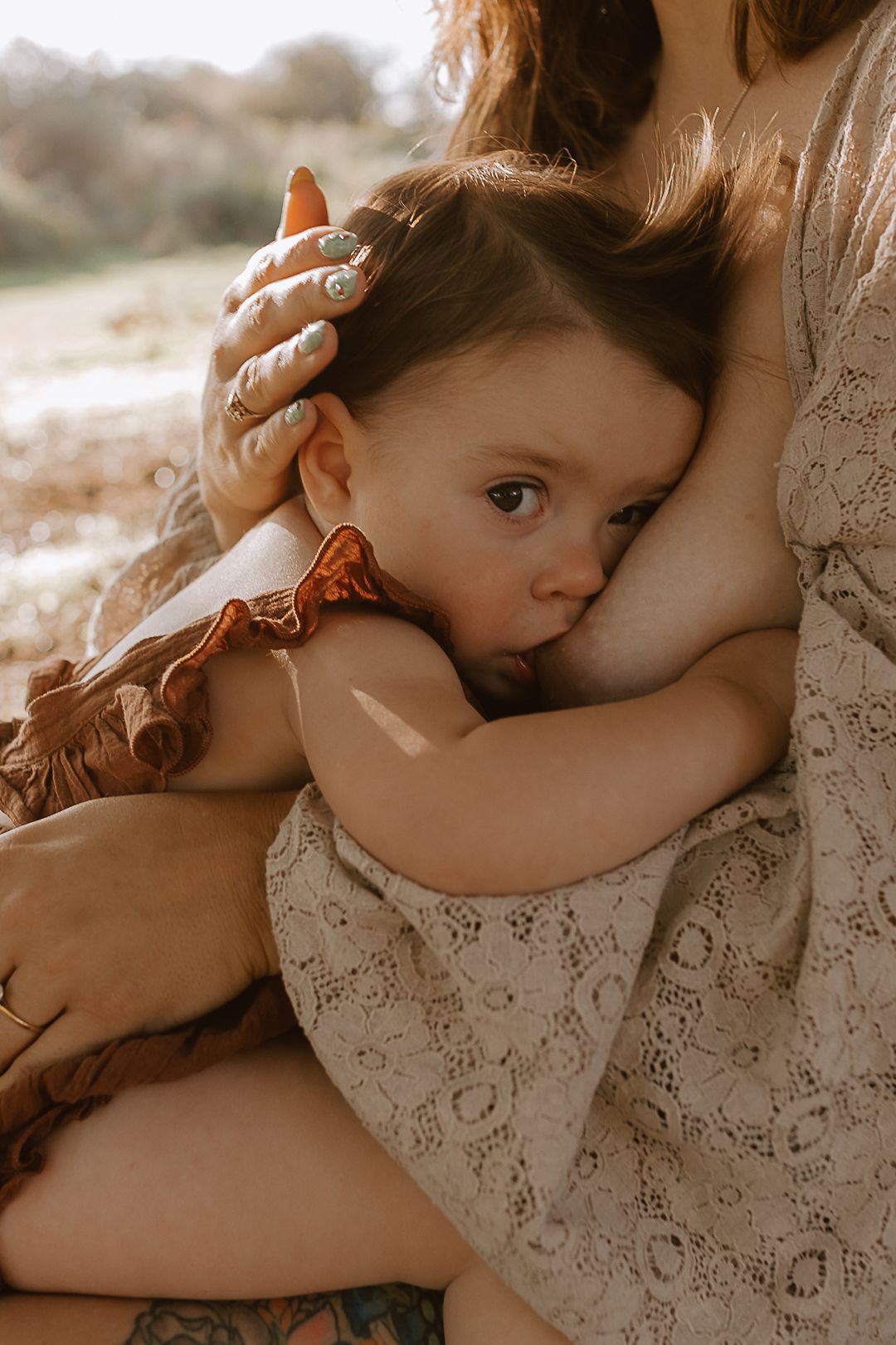 outdoors, natural, real, emotive, golden hour, breastfeeding