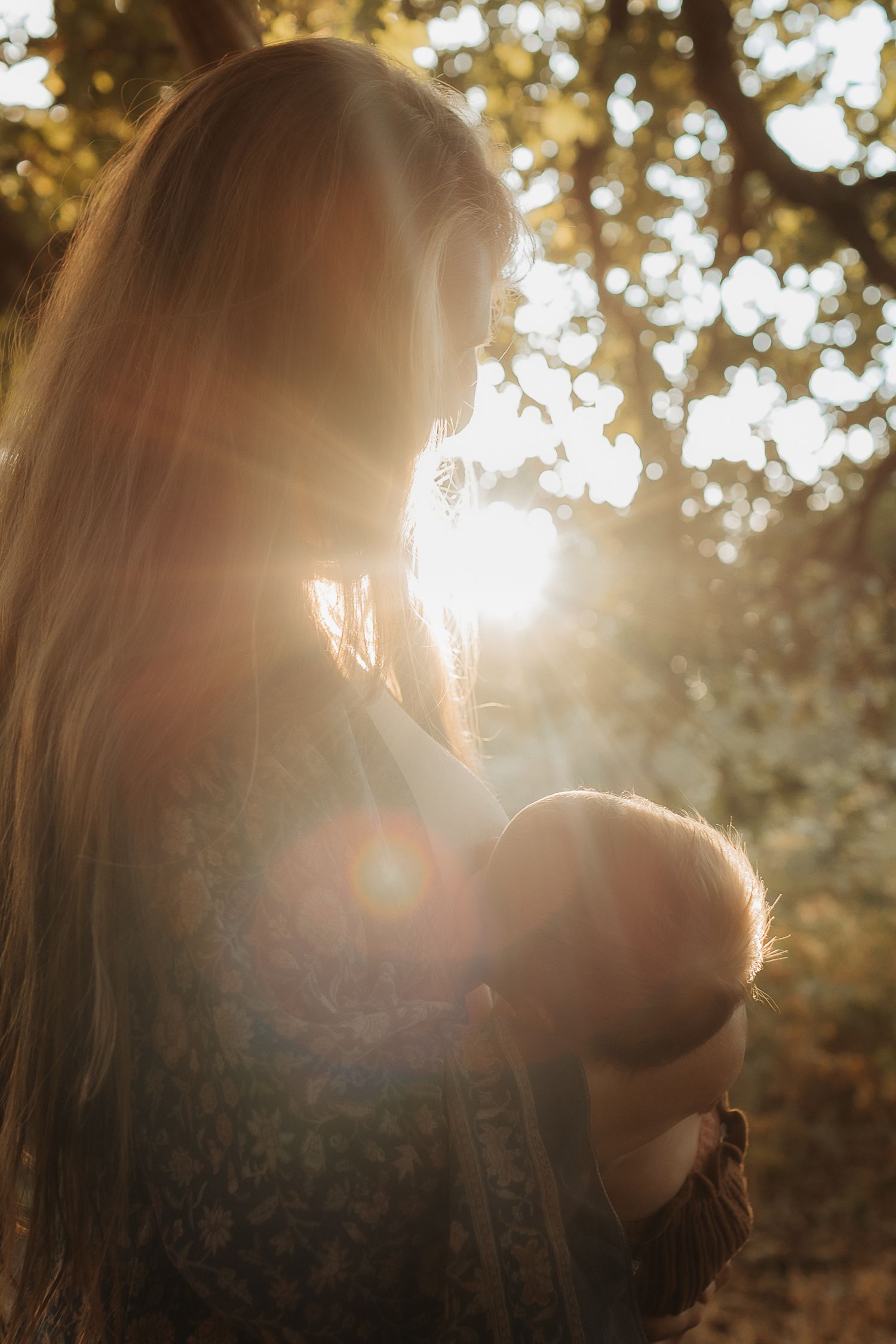 outdoors, natural, real, emotive, golden hour, breastfeeding