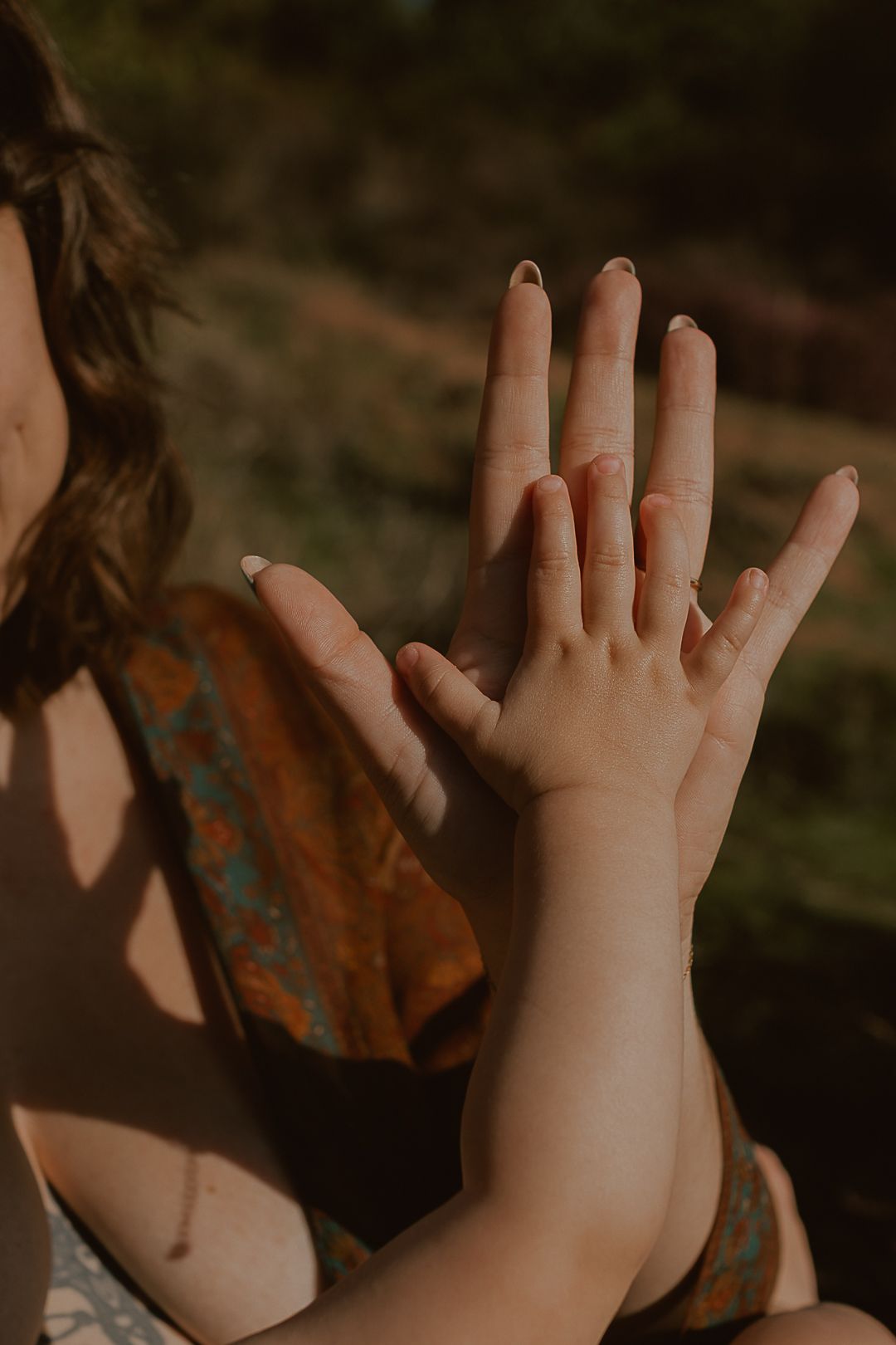 outdoors, natural, real, emotive, golden hour, breastfeeding