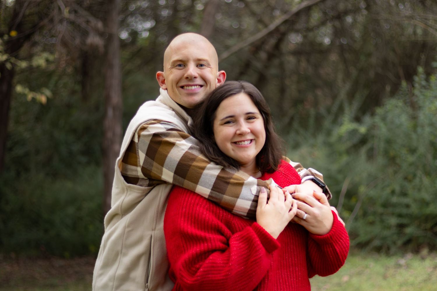 Photography family portrait of smiling couple embracing outdoors in setting professional portrait photography session warm happy family