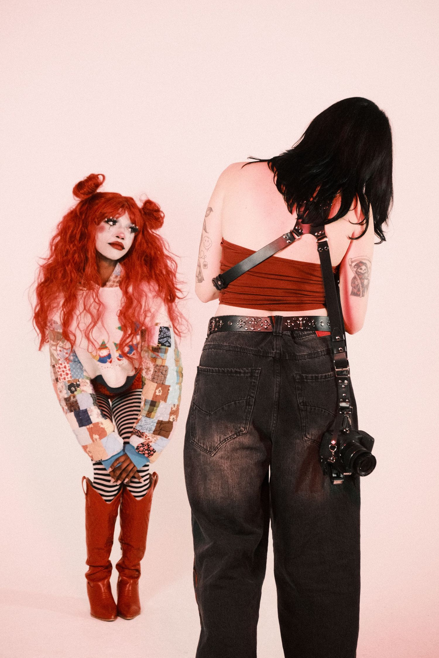 Fashion photography series featuring dark denim and a red-haired doll against a pink background.