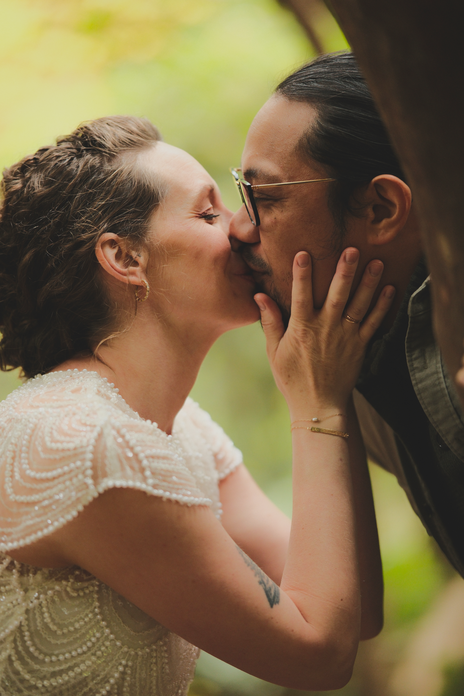 A romantic wedding photo sequence showing close-up kisses between a bride in lace and her partner.