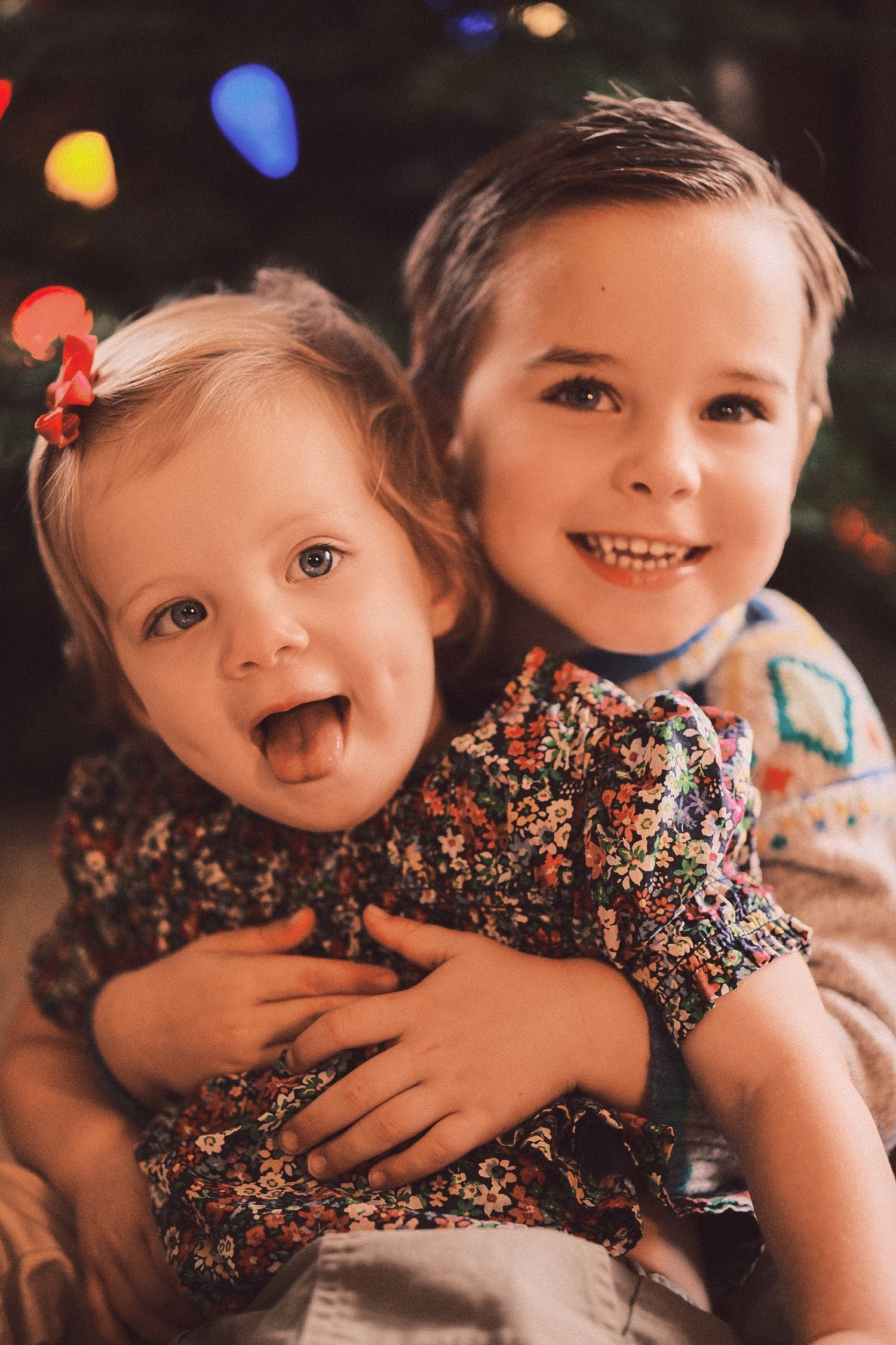 Candid sequence of children sharing hugs and smiles at a colorful party.