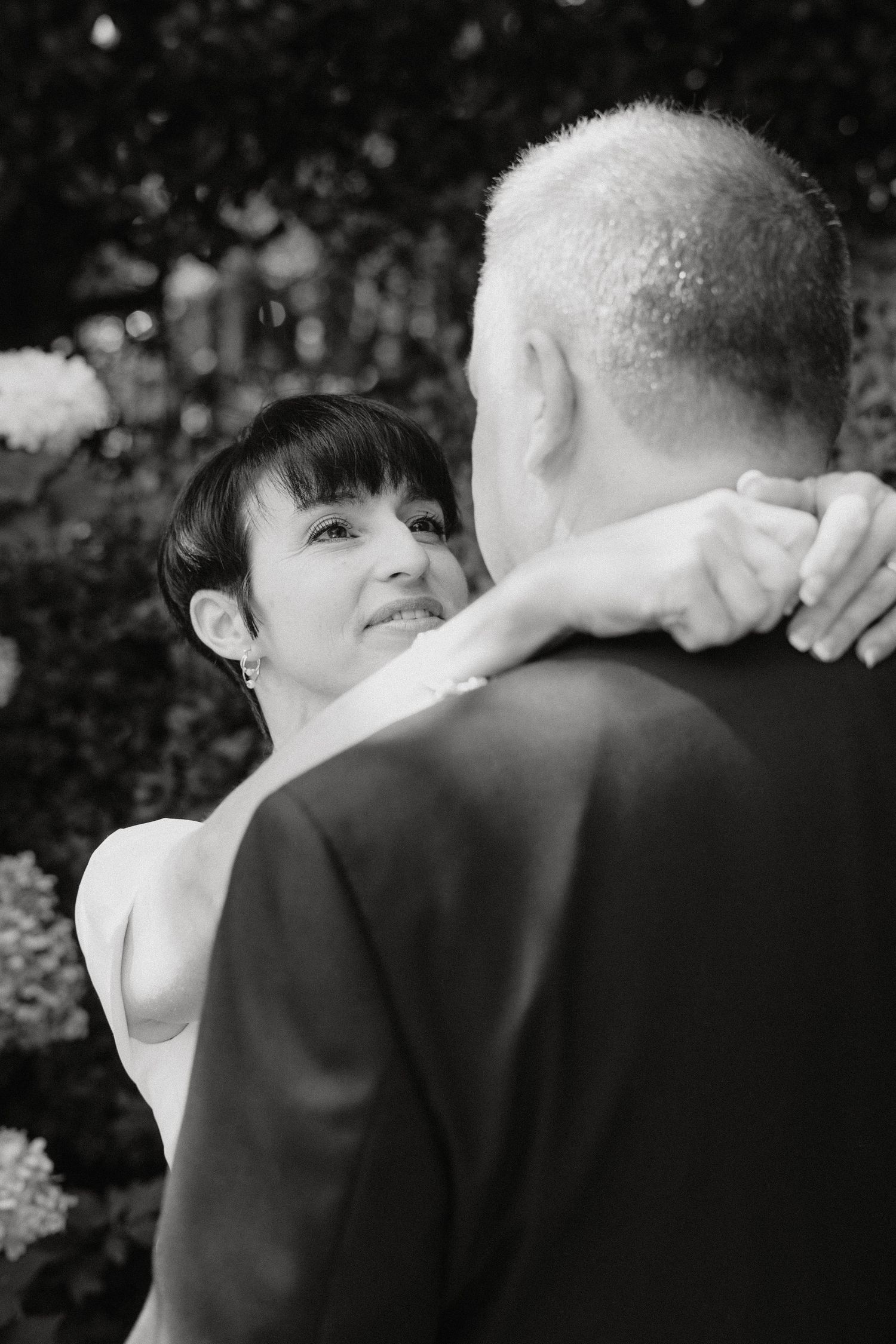 Intimate black and white wedding portraits showing tender moments.