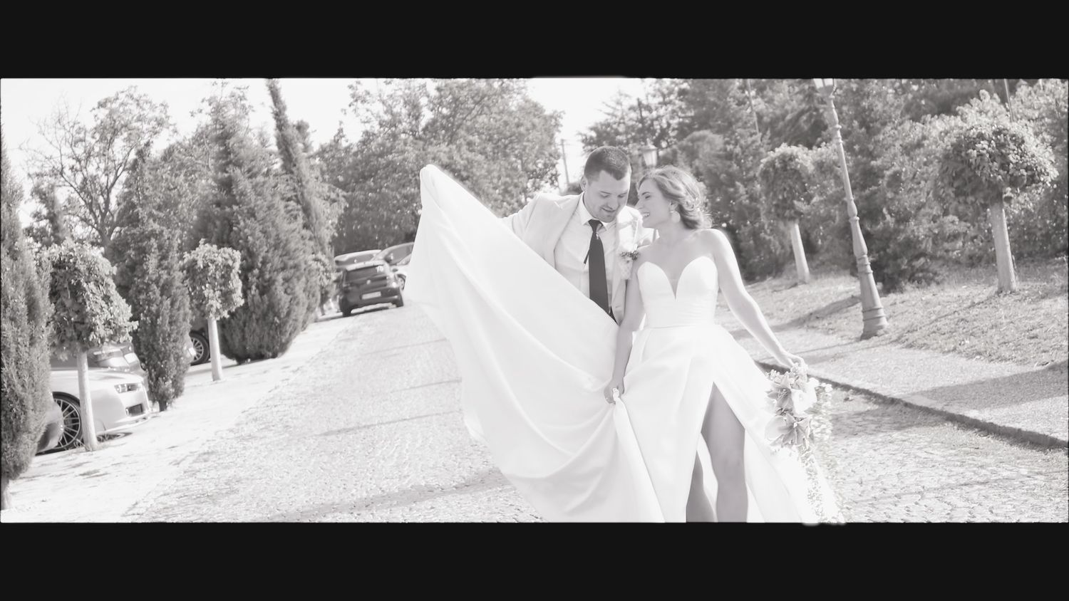Wedding celebration in a garden setting with soft natural light.