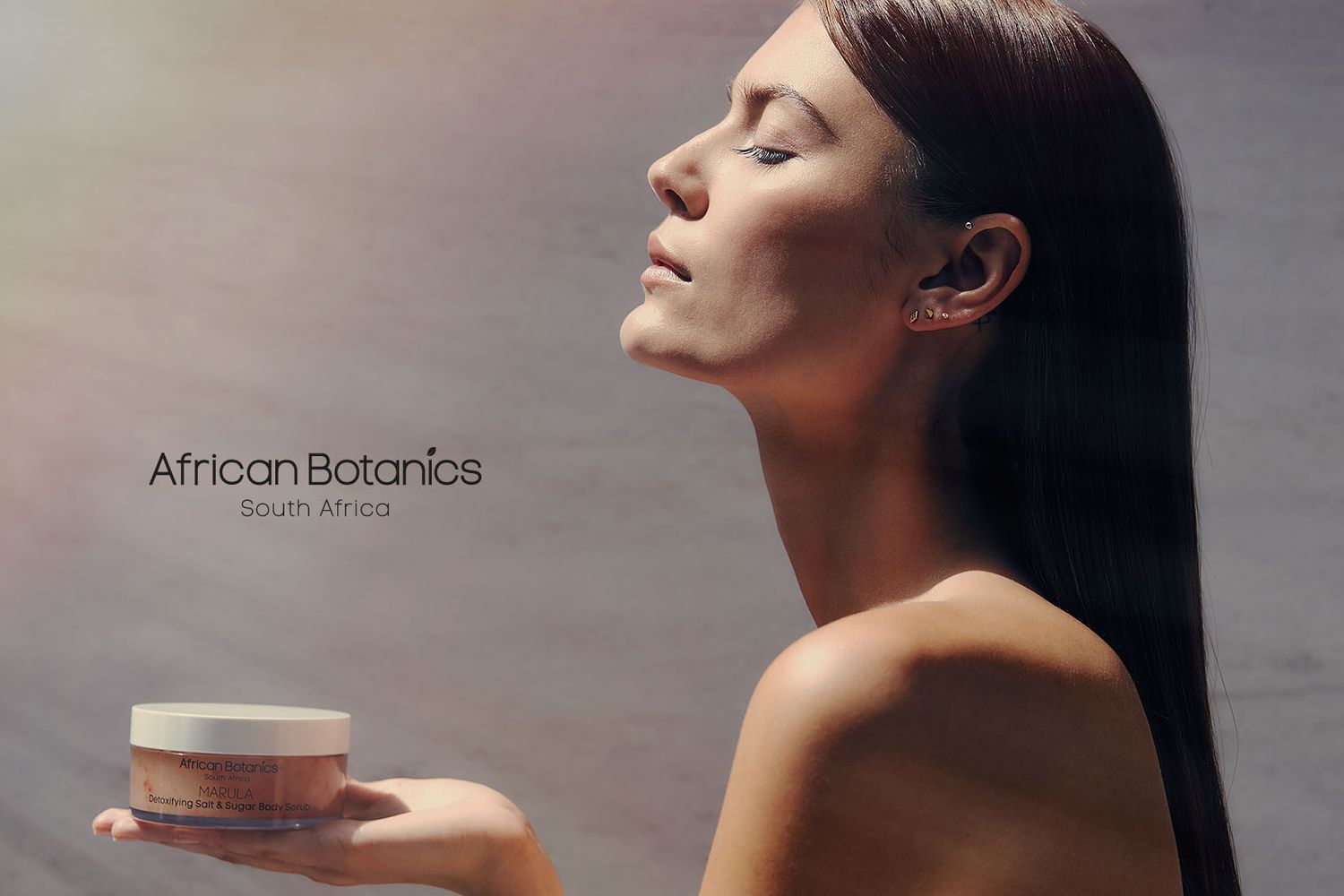 Elegant beauty portrait showcasing glowing skin and natural makeup for skincare campaign.