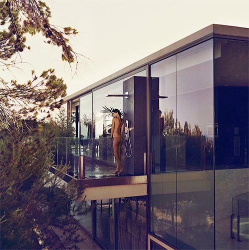Modern glass and steel architecture photographed during sunset.