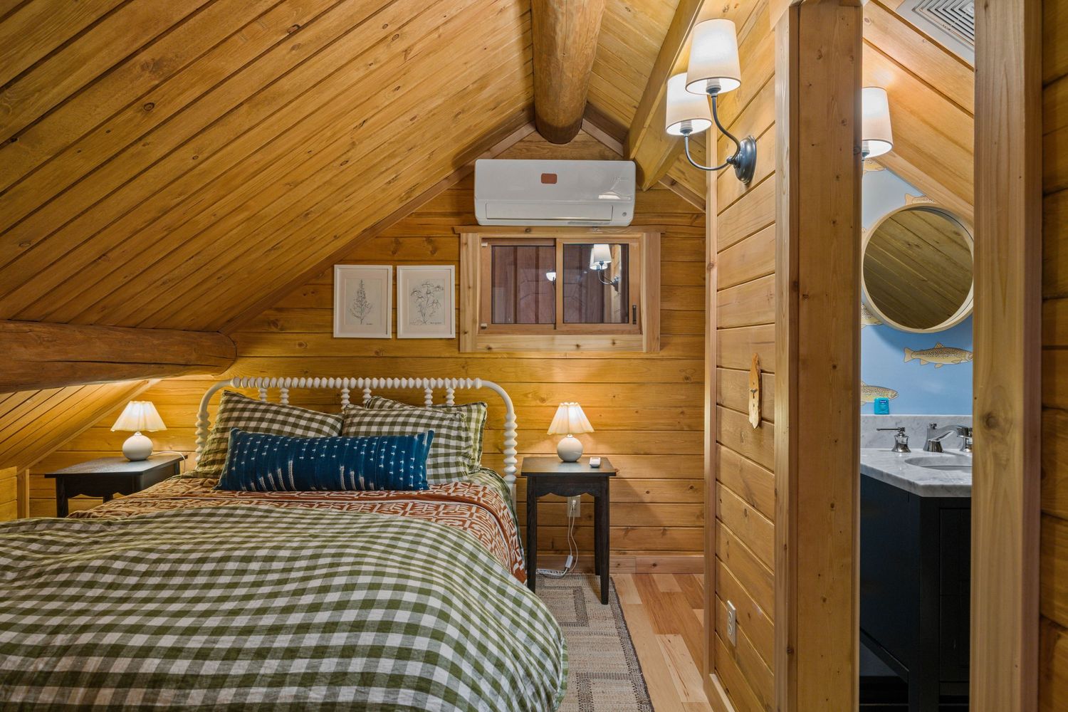 Guest bedroom in luxury Ennis, Montana home
