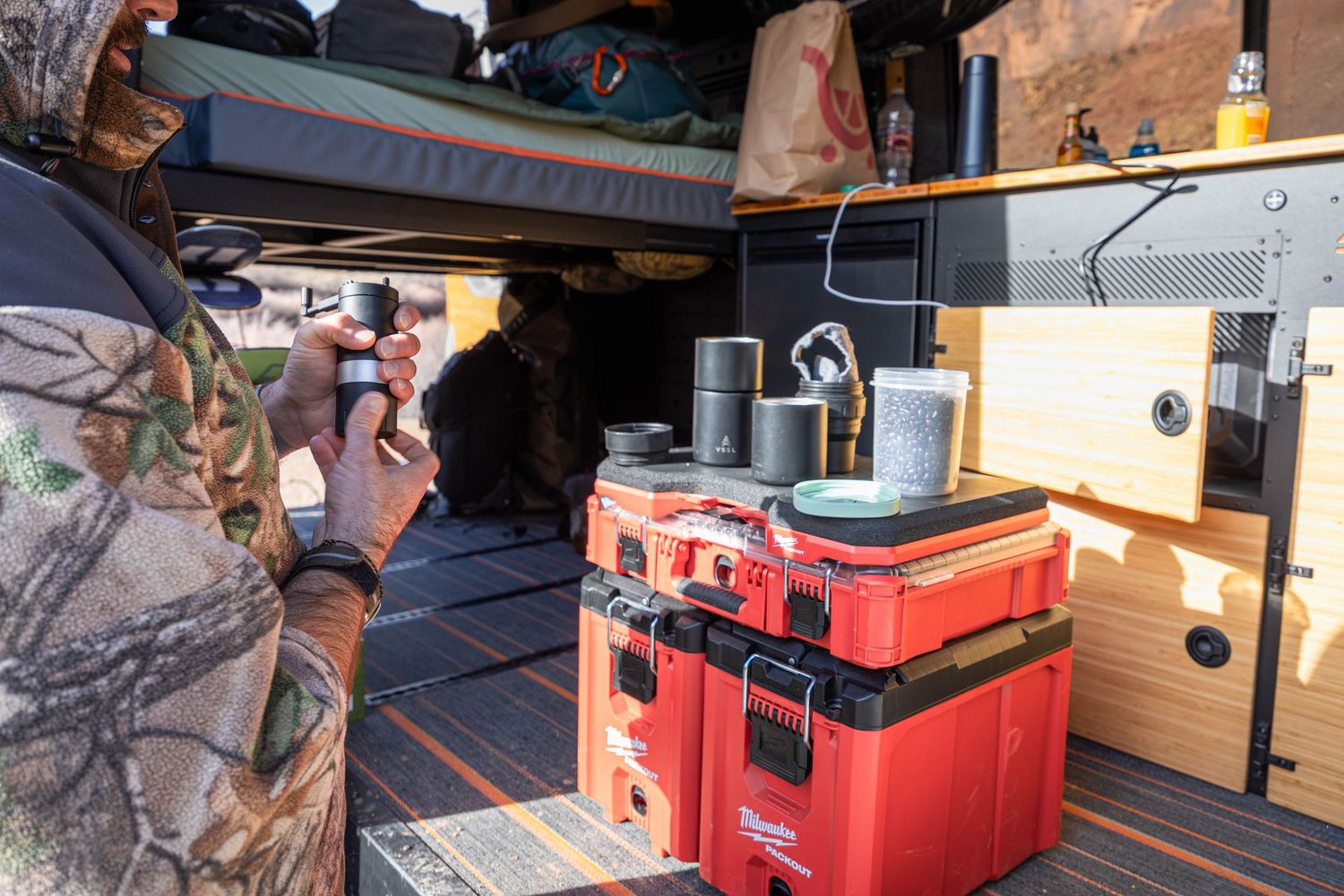 Milwaukee pack out system being used to make coffee in an adventure van while traveling through Moab, Utah