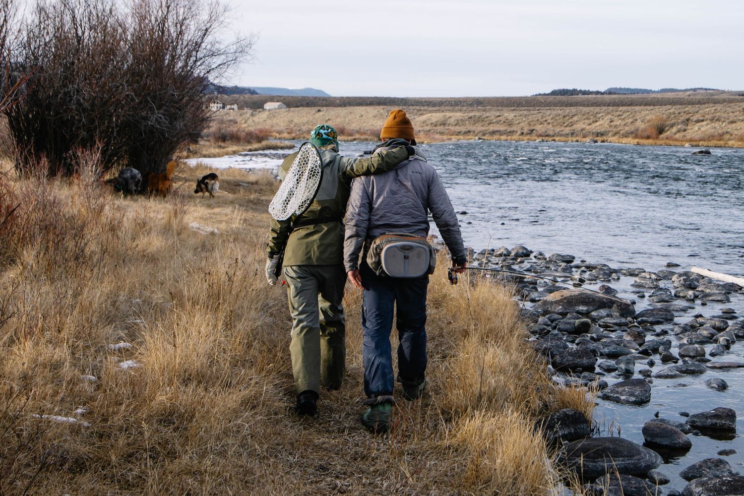 A couple fly fishing on the Madison River