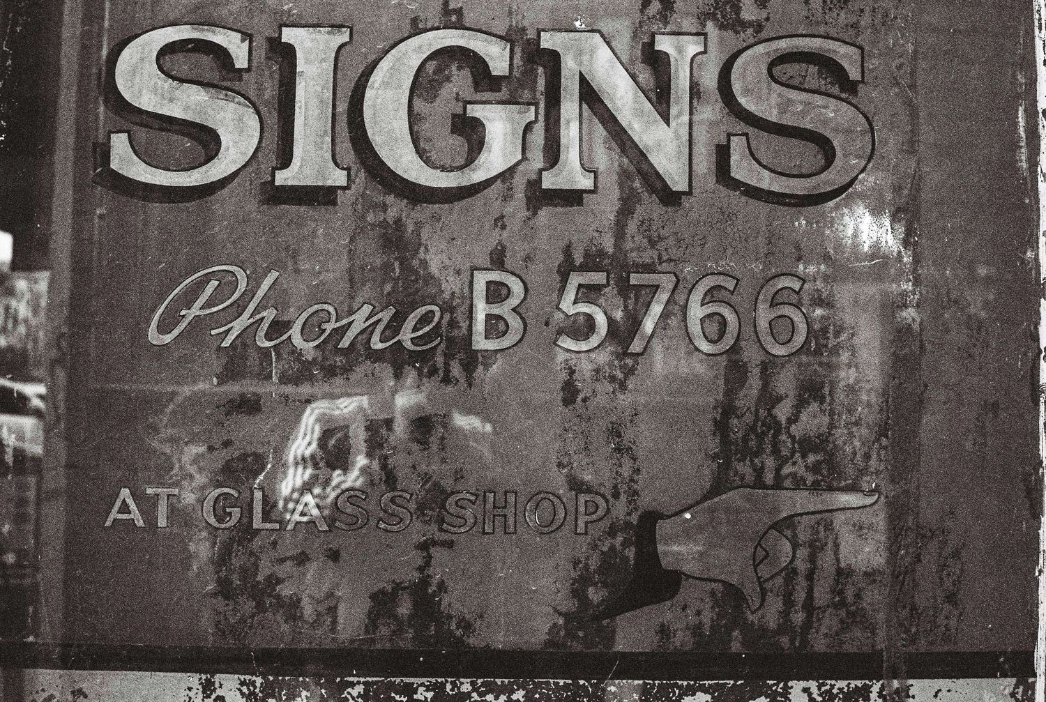 A film photo made with a 1968 Yashica Lynx 14e of an old sign in Ballarat, Australia.