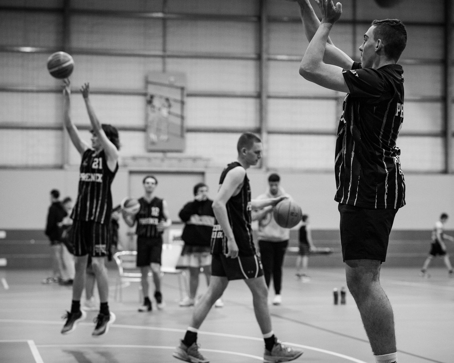 Basketballers practicing before the grand final at Junee, NSW, Australia.