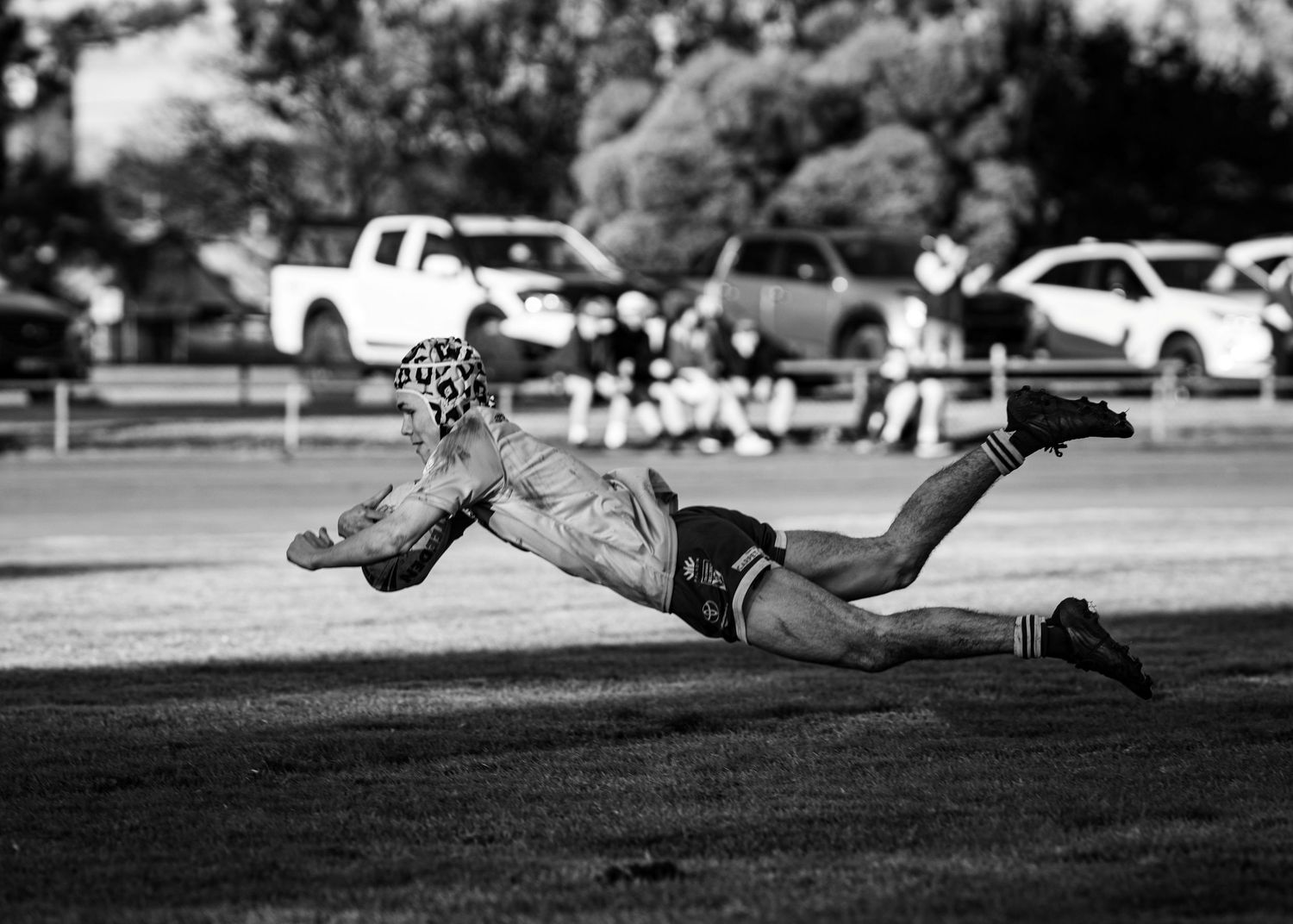 A Cootamundra Bulldogs player scoring a try at Les Boyd Oval, Fisher Park, Cootamundra, NSW, Australia.