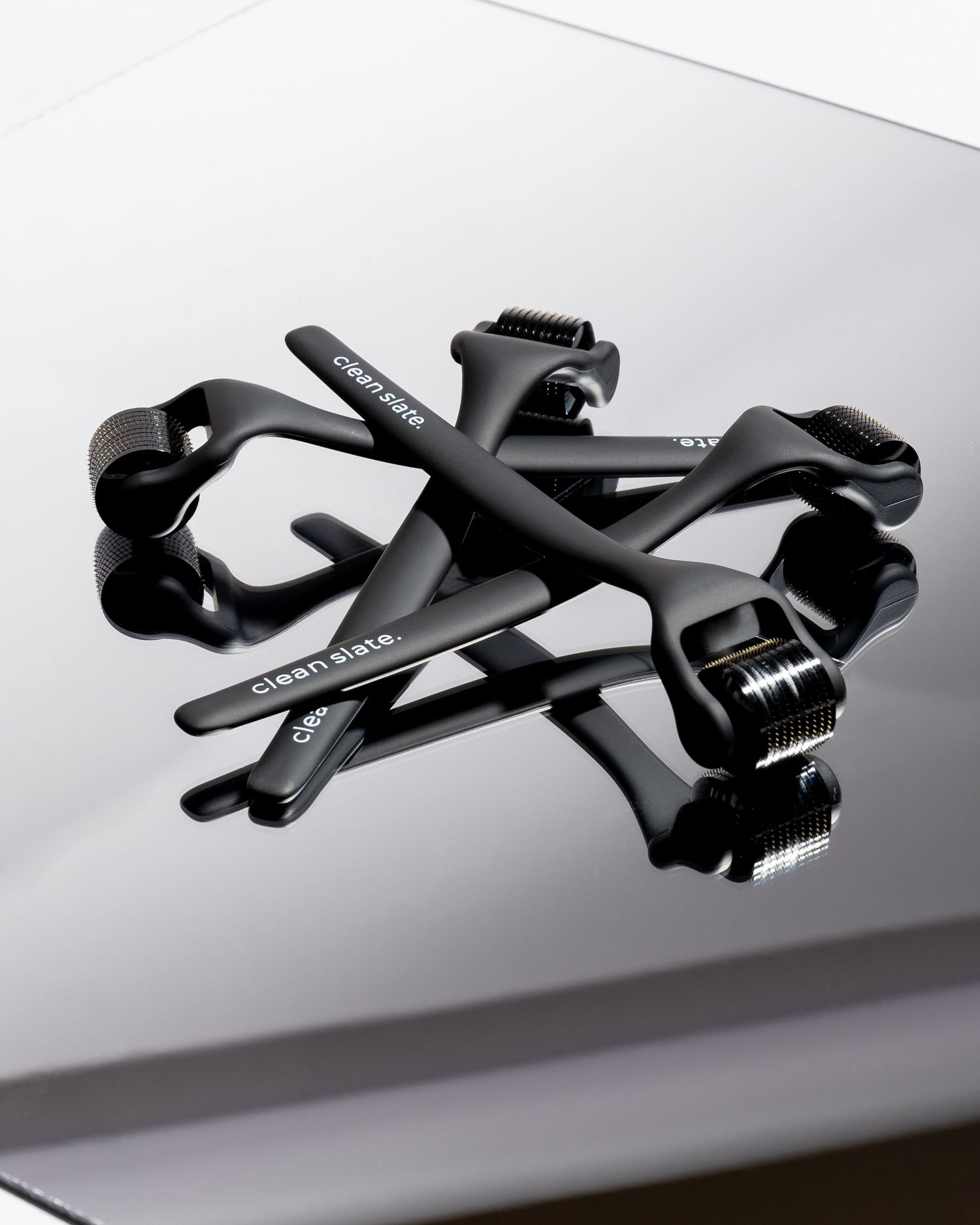Black bicycle pedals shown in sequence against white background demonstrating range of motion.