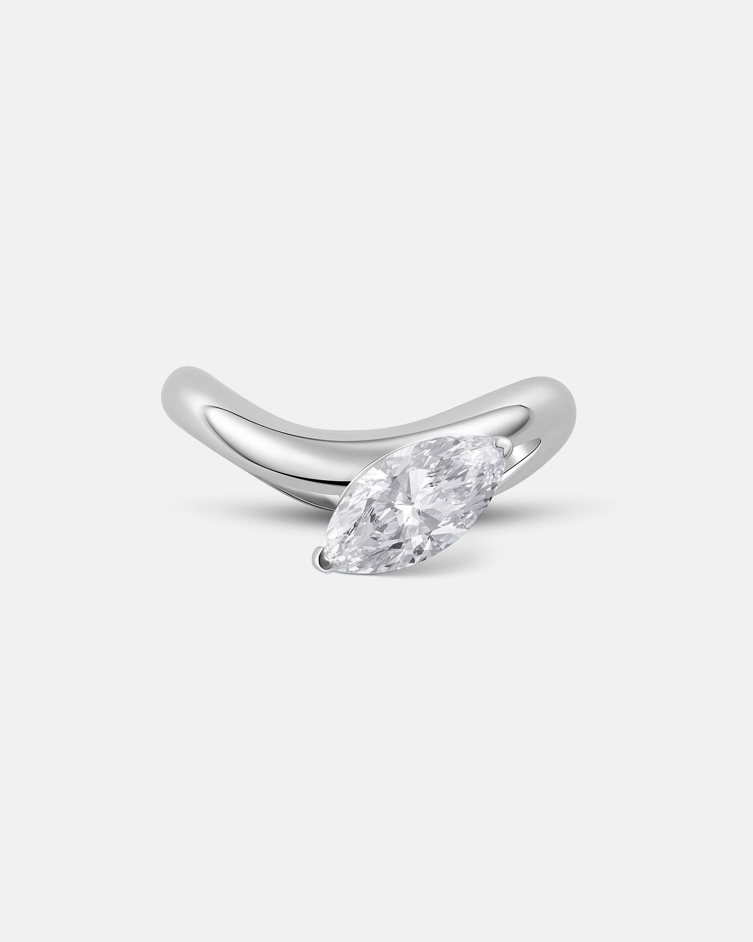 Modern silver ring with diagonal crystal design shown from multiple angles.