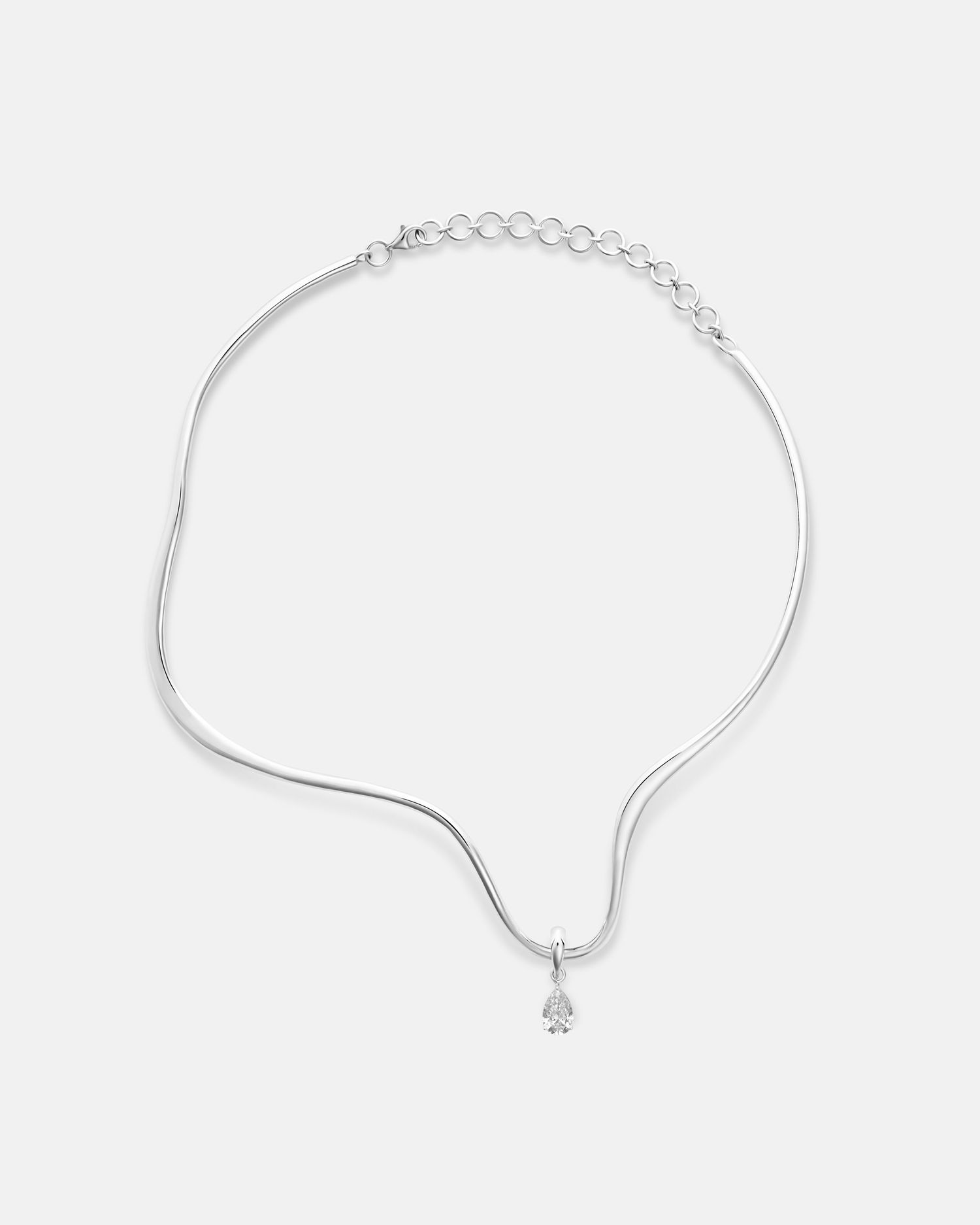 Minimalist silver choker necklace with small pendant shown from different angles.