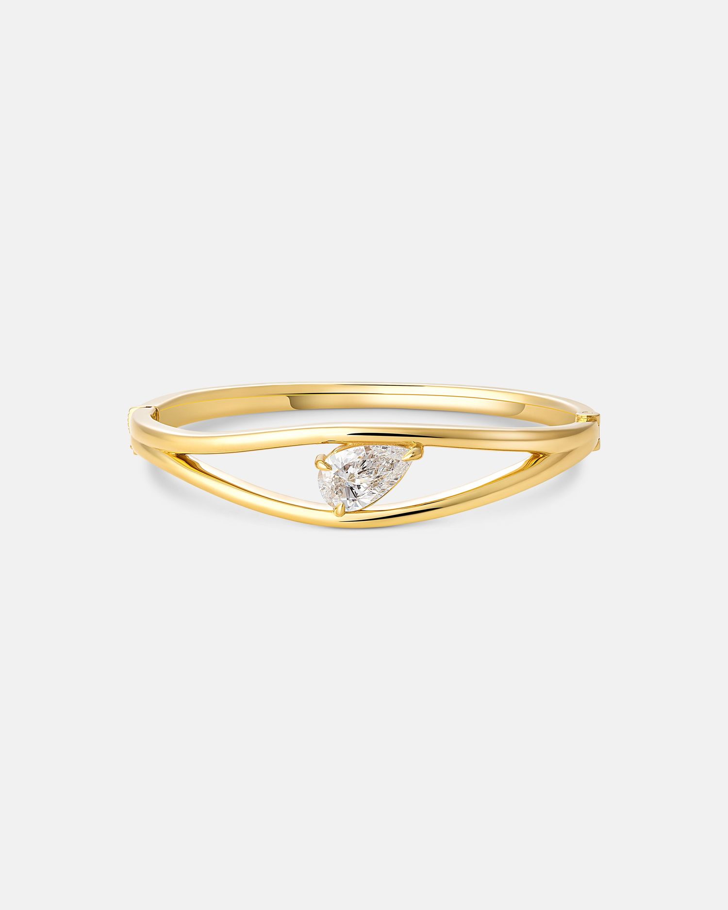 Delicate gold bangle bracelet with small diamond accent shown from multiple views.