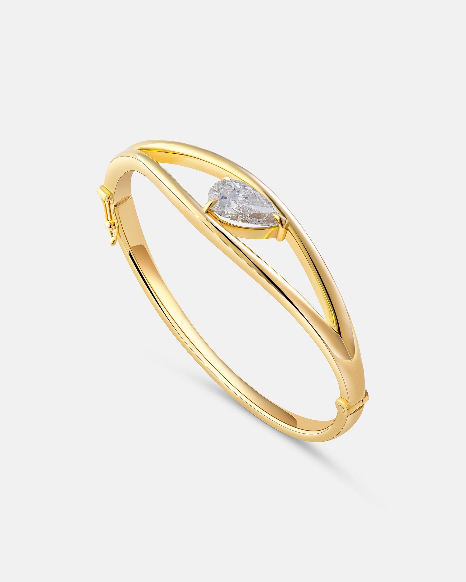 Delicate gold ring with small diamond accent in modern minimalist design.